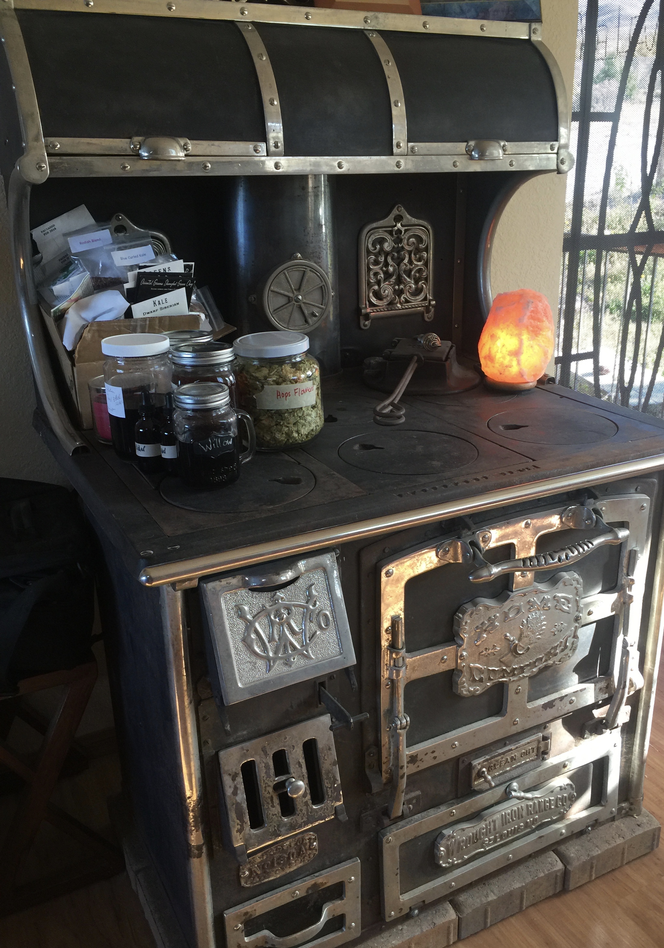 Here is our stove. Sorry---I've got some of my tinctures, herbs, and seeds up there right now. It's summer, after all! 