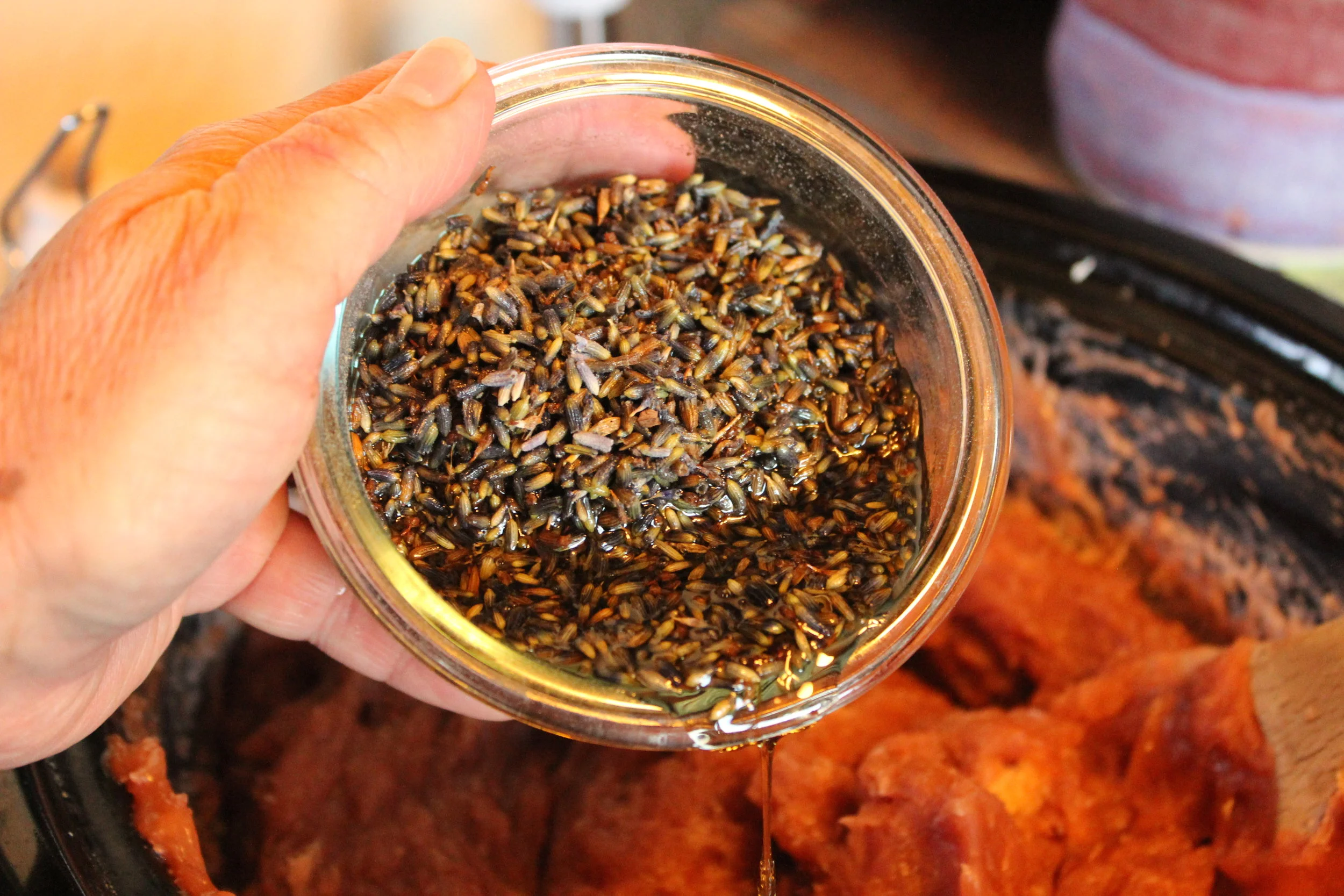 Here are the Lavender flowers which have been soaking in the EO blend for the past hour or so! Getting ready to pour them in!