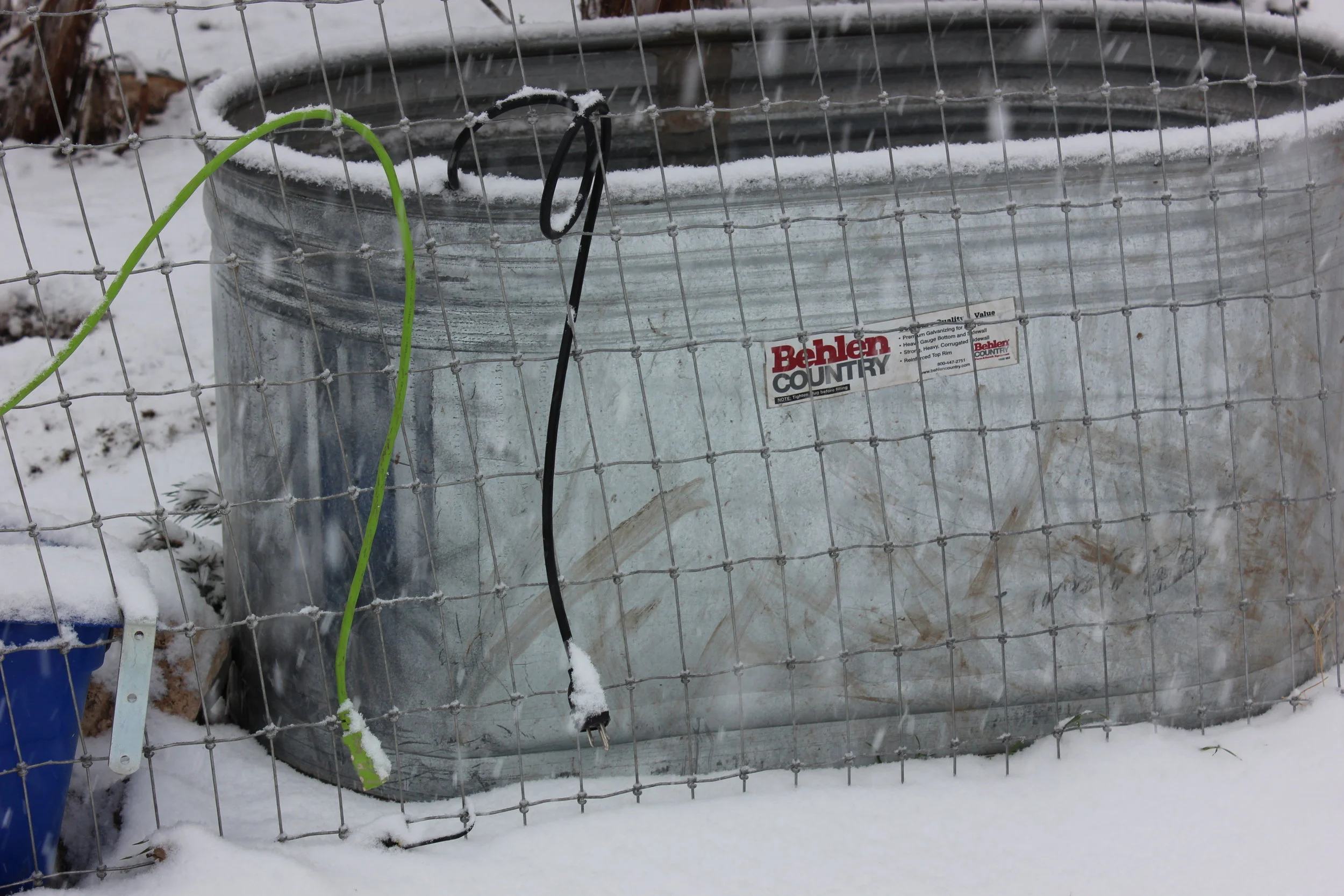 This is the old set up for the de-icer. Not a great thing. We finally got an electrical box set up out here with a switch in the solar shed so we can turn it off and on remotely. 