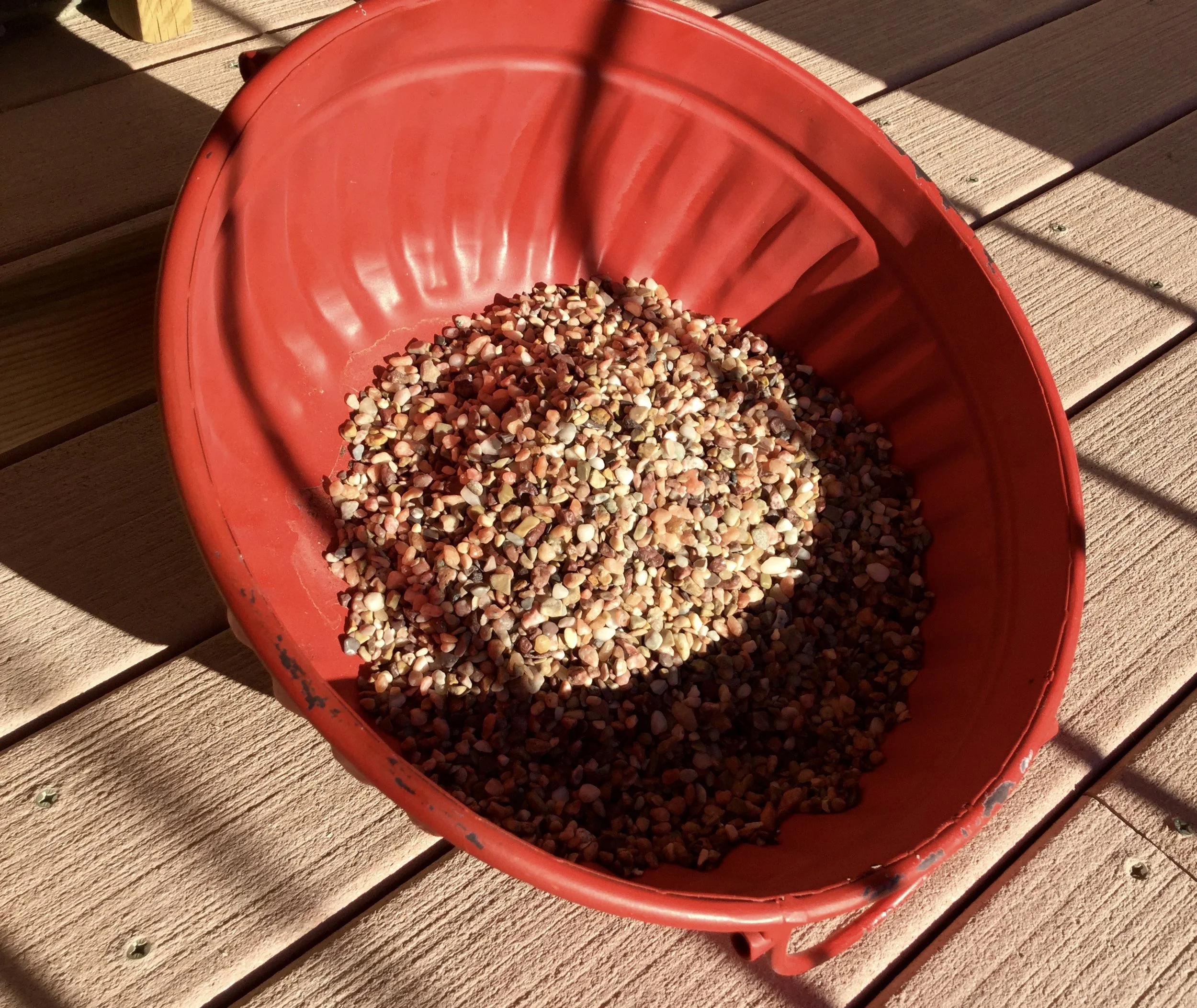 Small pebbles/gravel in the bottom of the bowl will help keep the water from making soggy soil and potentially drowning the plants.