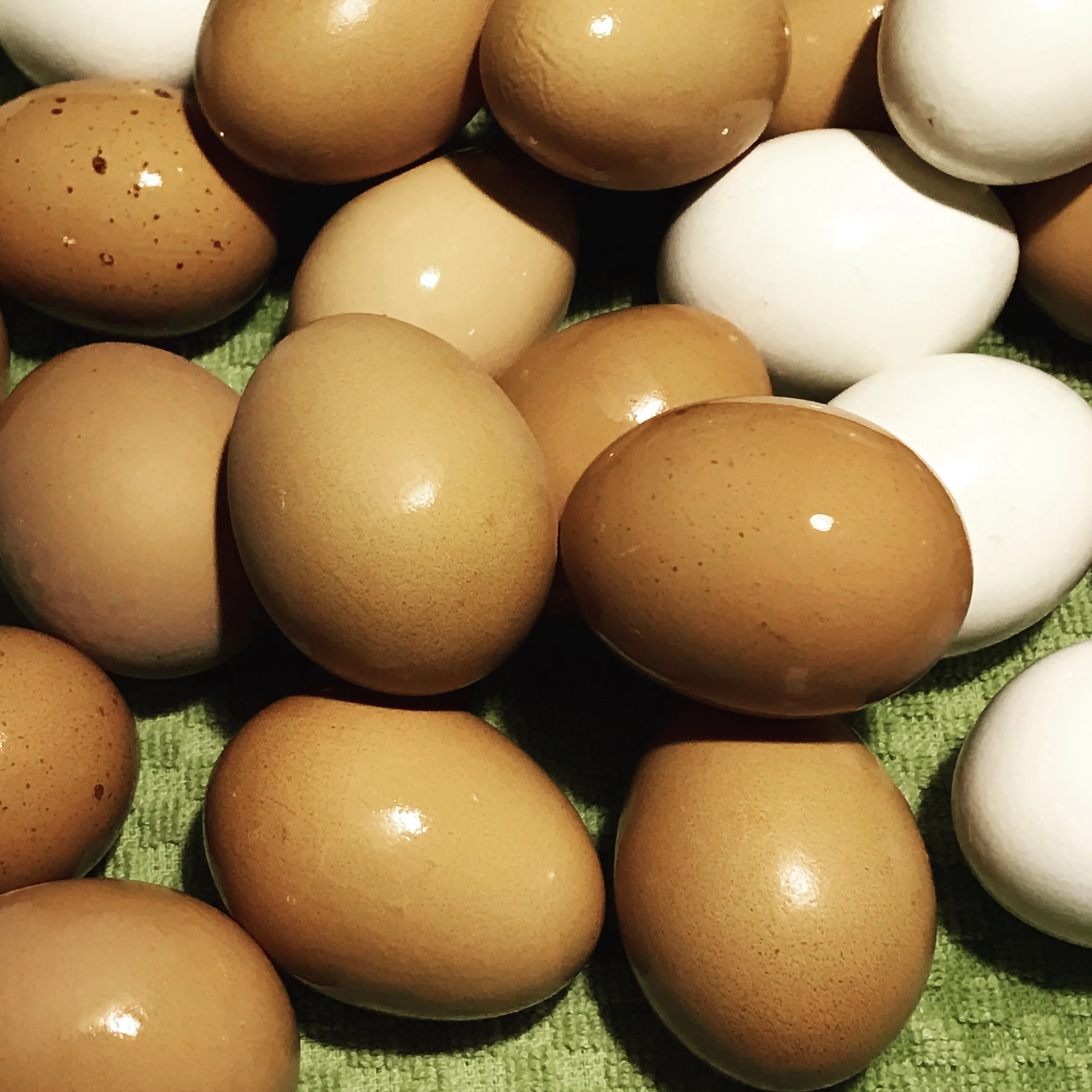After removing the cooked eggs from the water, I just let them sit awhile to completely cool before peeling.