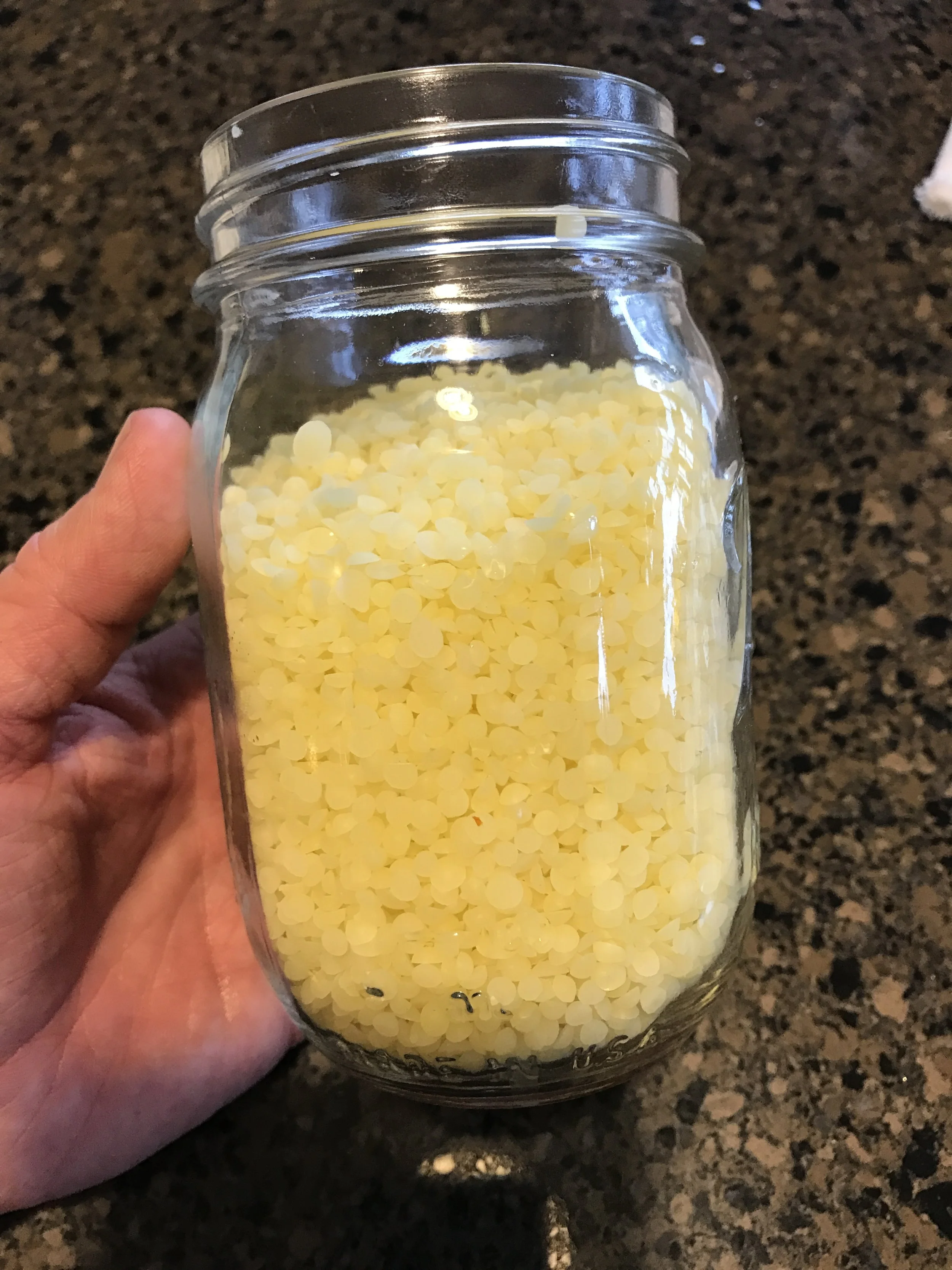 Here is 7 ounces of beeswax, measured with my kitchen scale . You'll need a kitchen scale for soap making as well as candle making. 