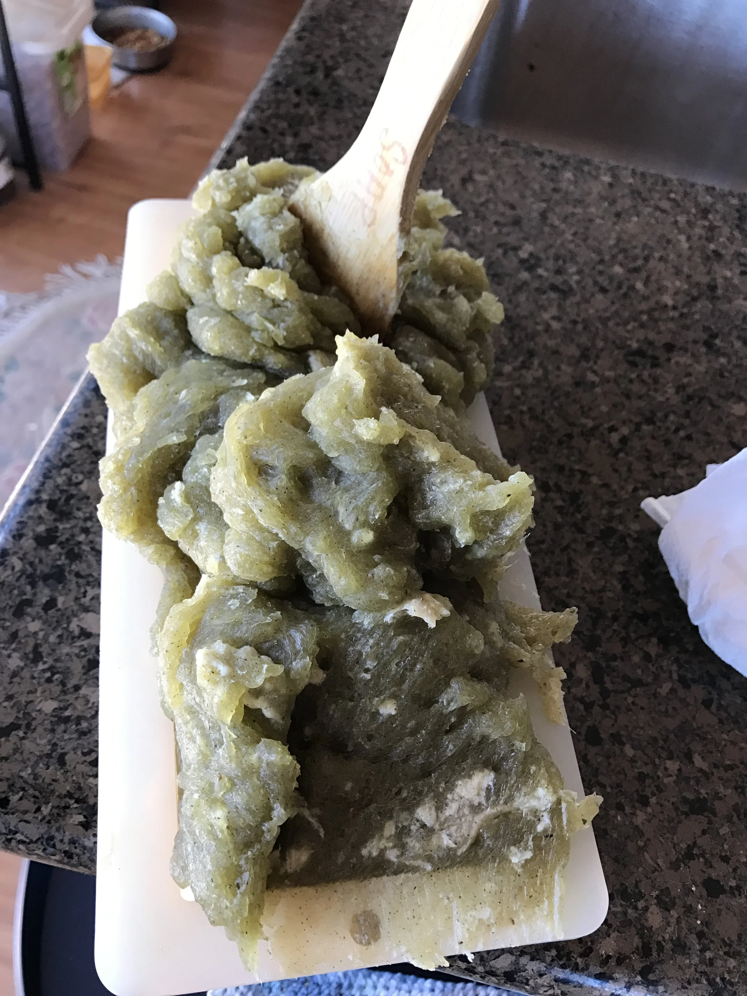 It's ready!! Glopping and pressing it into the soap mold . It's SUPER hot at this stage, so be careful!