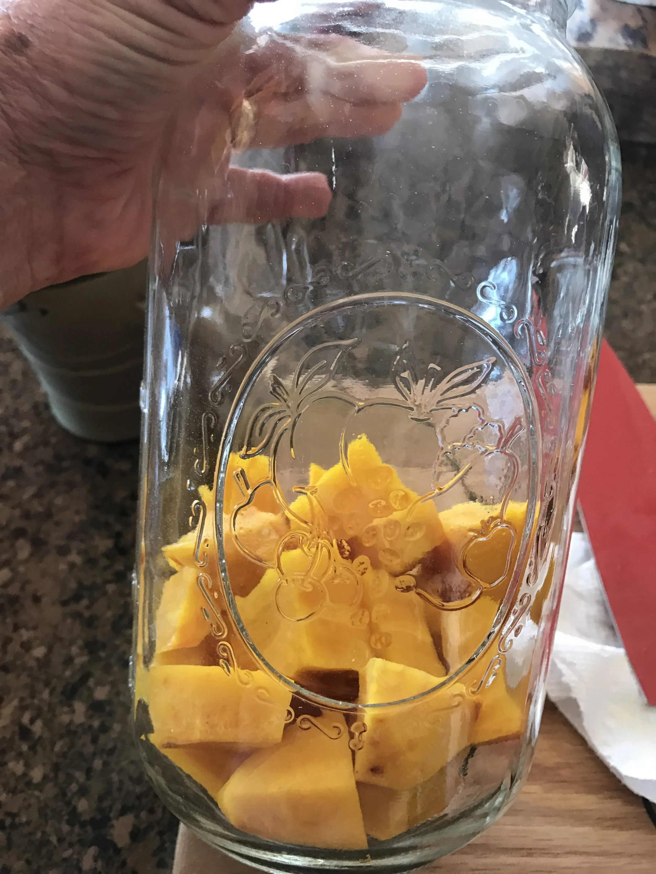 Chopped up beets placed in the clean jar. About an inch size pieces are just fine.