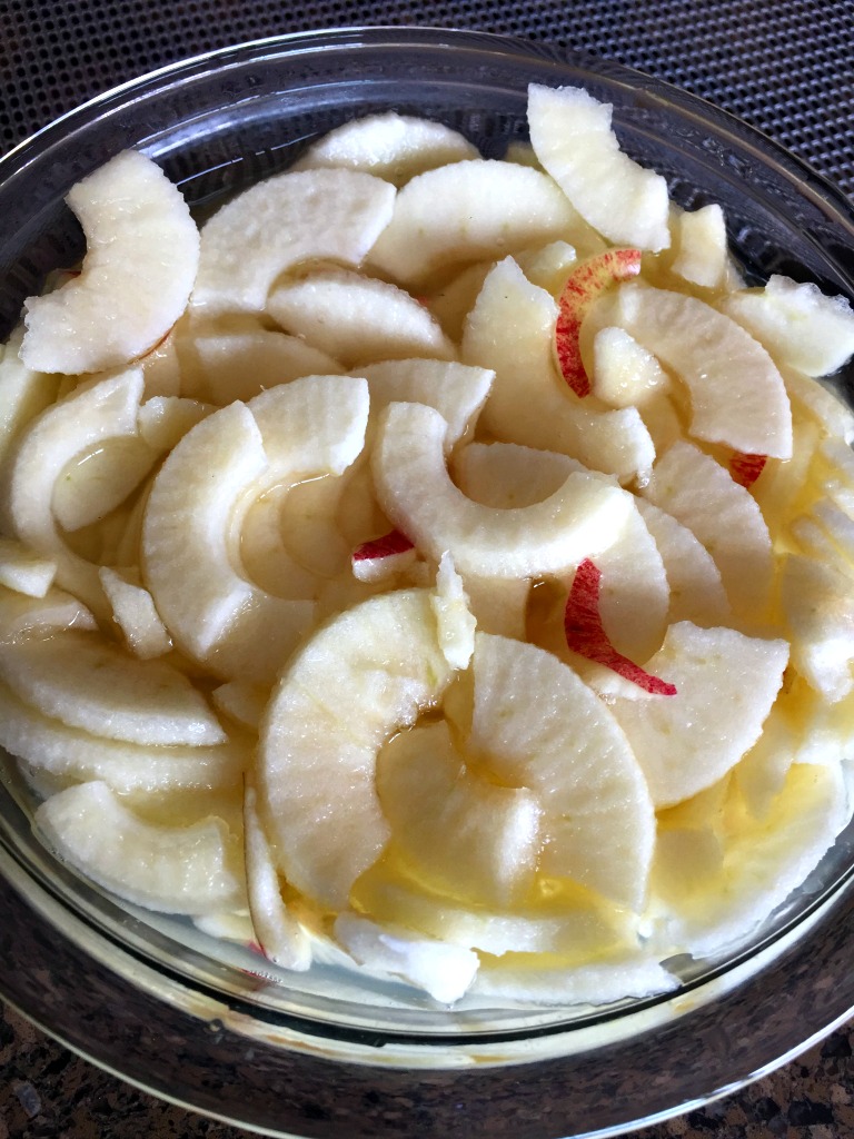 Slices soaking in the lemon juice & water solution