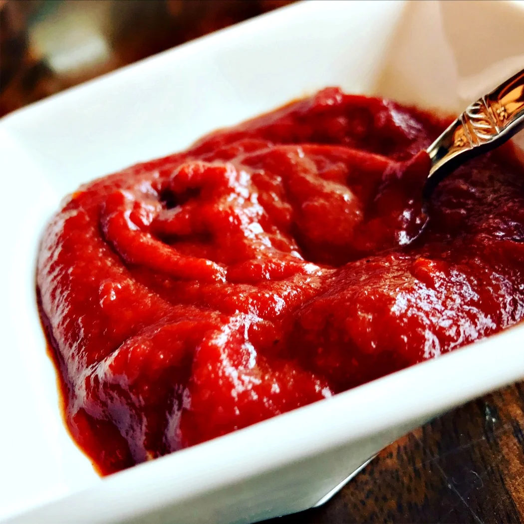 This is homemade fermented ketchup. It's not only healthy and filled with probiotic, but it's the most delicious ketchup you'll ever eat! Learning how to ferment your foods is a traditional cooking skill that will help keep you healthy. Here's the recipe and directions for this fermented ketchup, if you're interested .