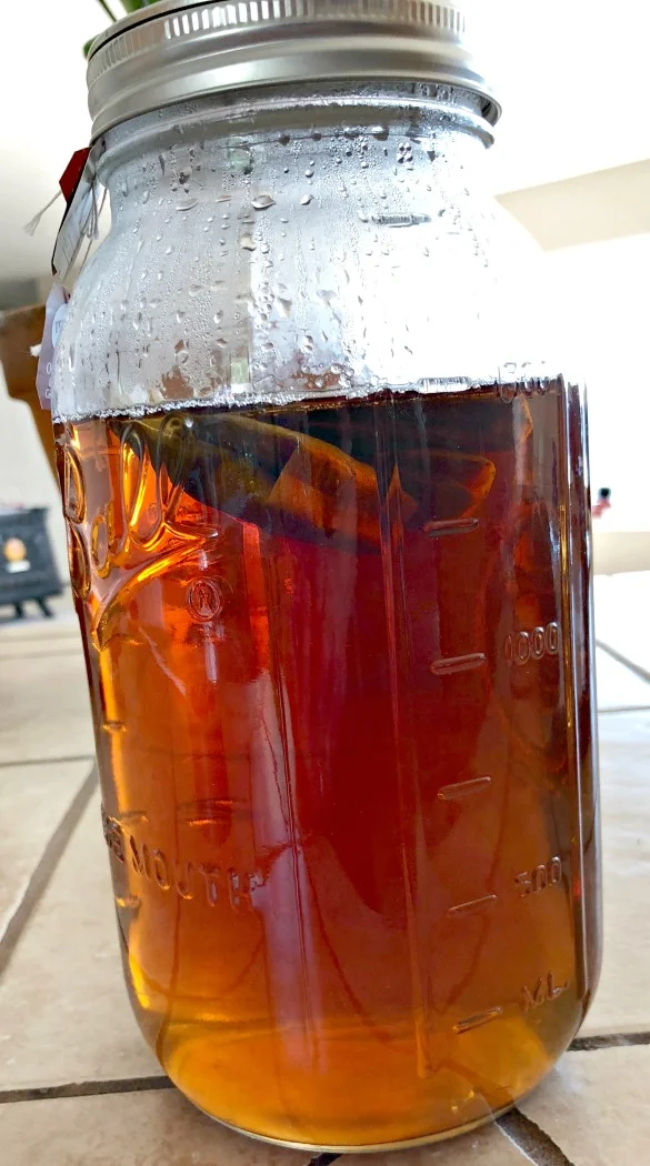 Make a STRONG Black tea. I let mine steep for hours while it cools down. If I need more water to fill the jar, I add it later.