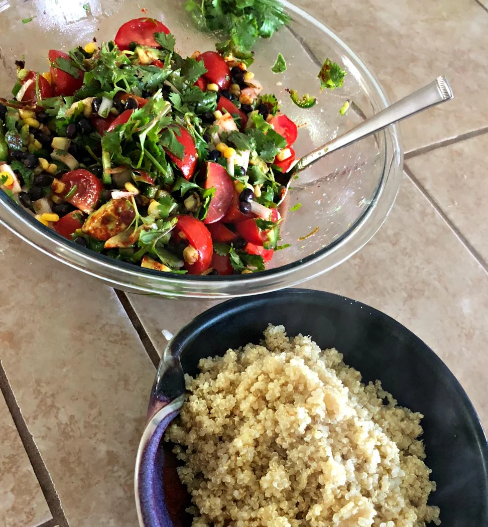 The main ingredients are all mixed up, and the quinoa is cooling. Once it's cooled down, just mix together well and store in the fridge for a few hours or overnight. You'll have the MOST delicious salad!