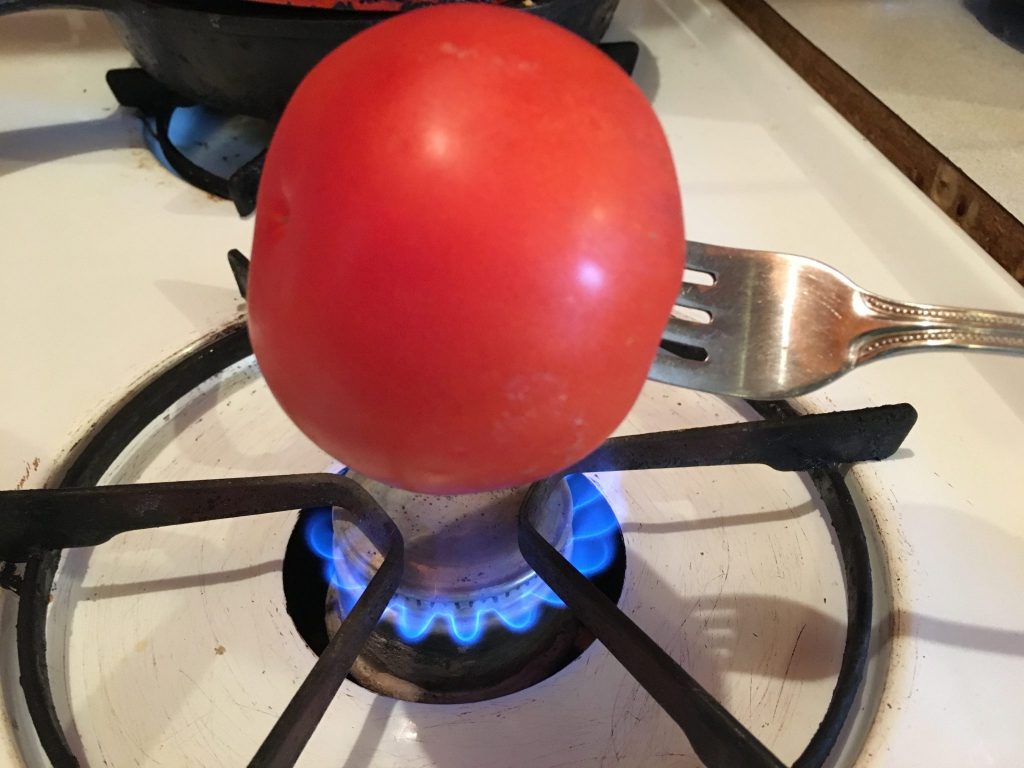 Here's one of the six ideas for peeling tomatoes from my friend, Delci---Who knew?