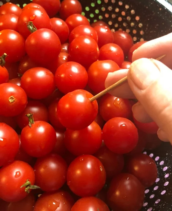 You need to pierce the skins two or three times in order for the fermenting liquid to get in there and do its thing! I used a toothpick for these little cherry tomato balls.