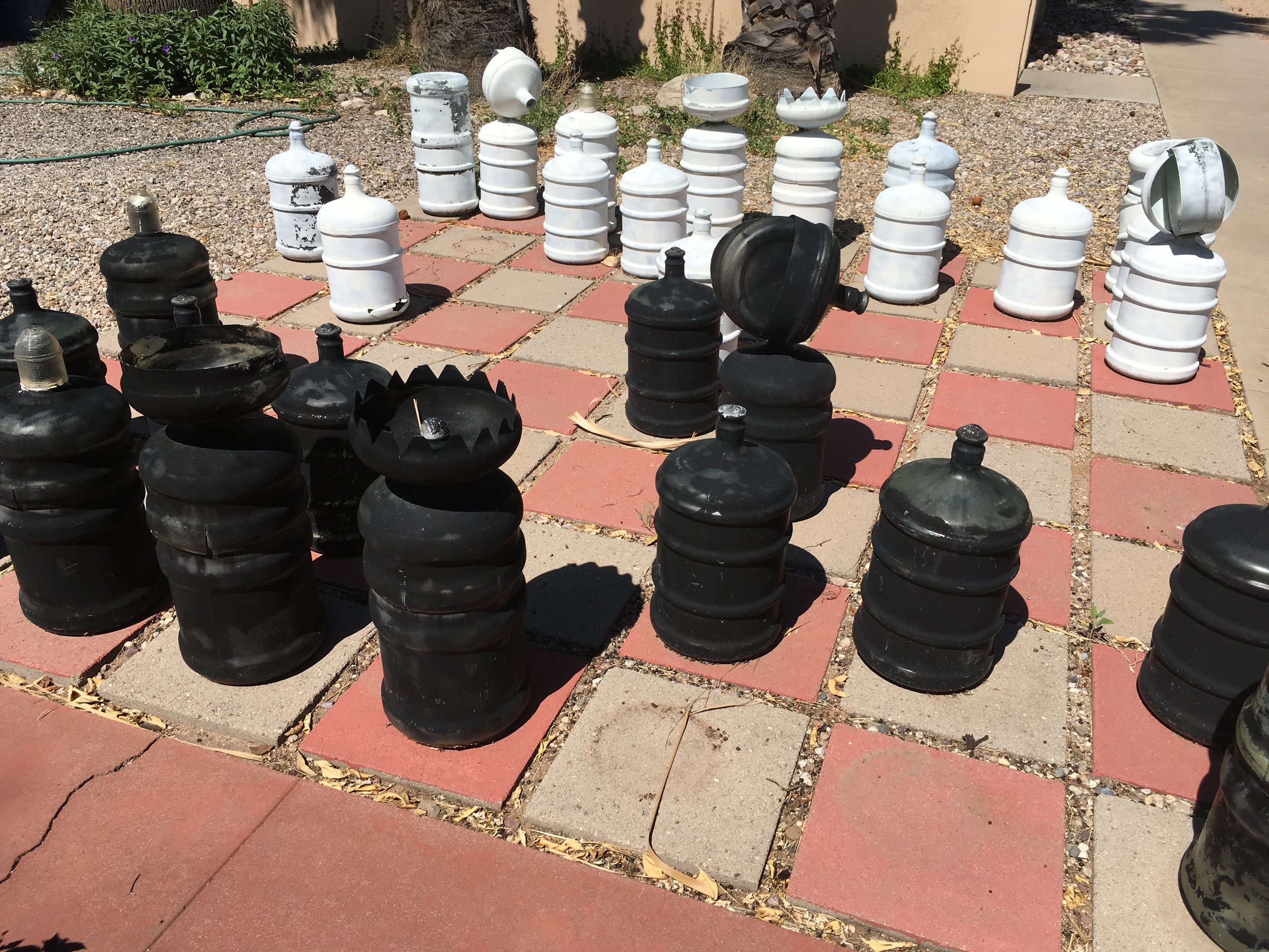 These old water jugs have taken a beating from the desert sun, but they were a fun idea. Sam Hughes neighborhood.