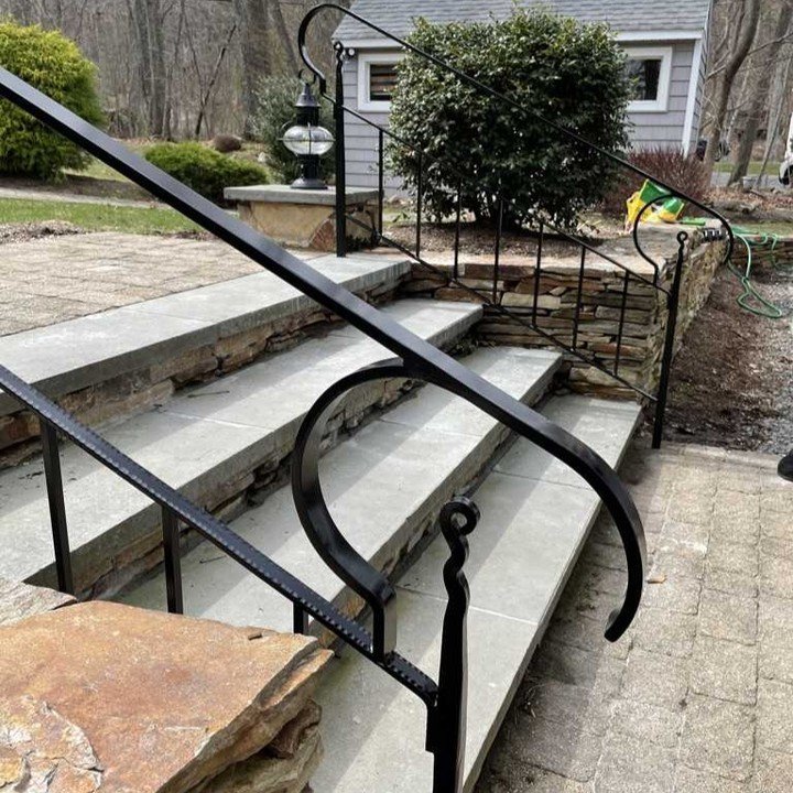 Our pieces are not only functional, but they also have style - and this custom hand rail is a great example! It also dresses up the outside space where you may not expect it. 

#ironmountainforge #madeinRI #blacksmith #forged #welding #customironwork