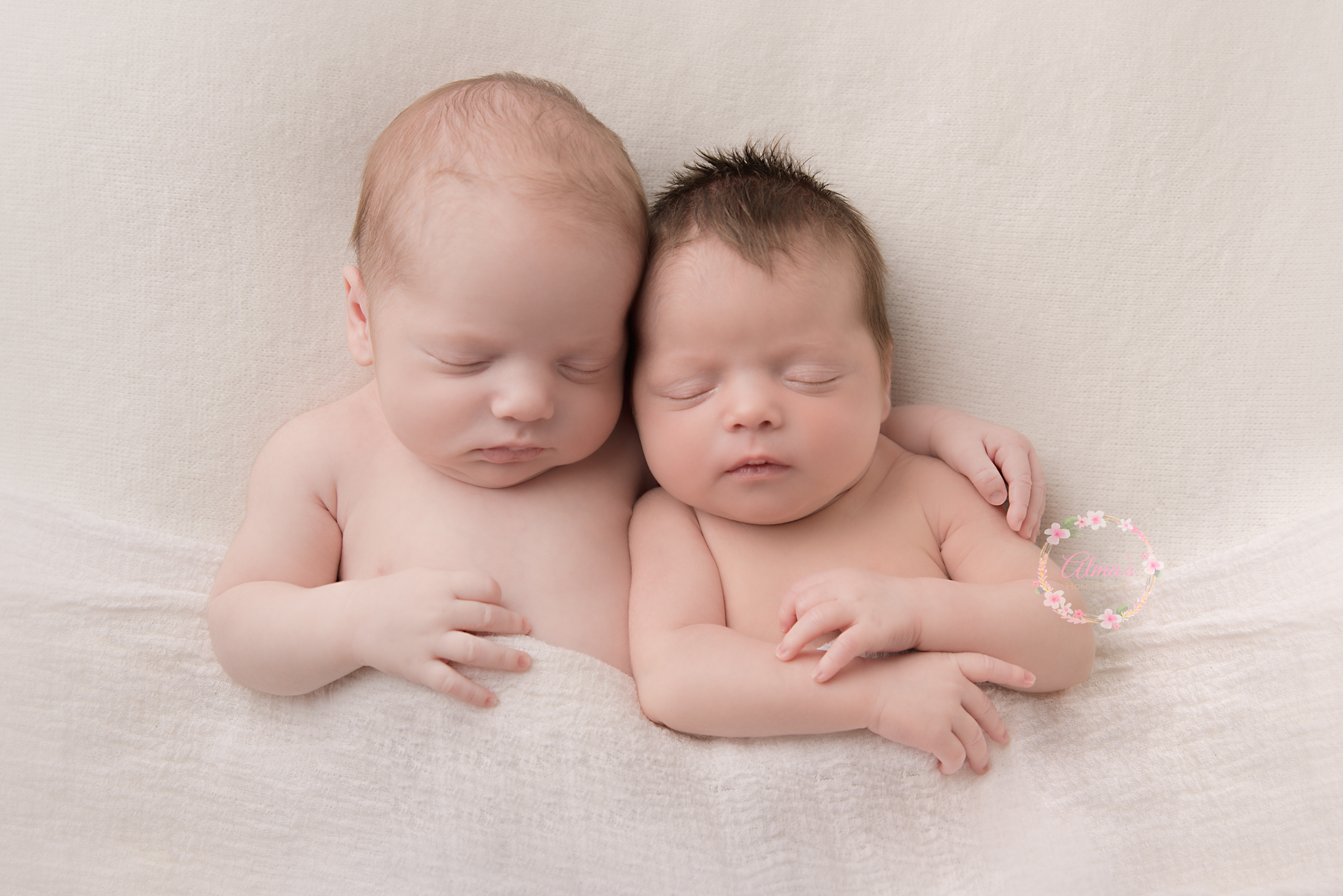 Newborn twins photographed on the bean bag. Big brother cuddling his sister. Newborn photograpy by Alma's Home Studio
