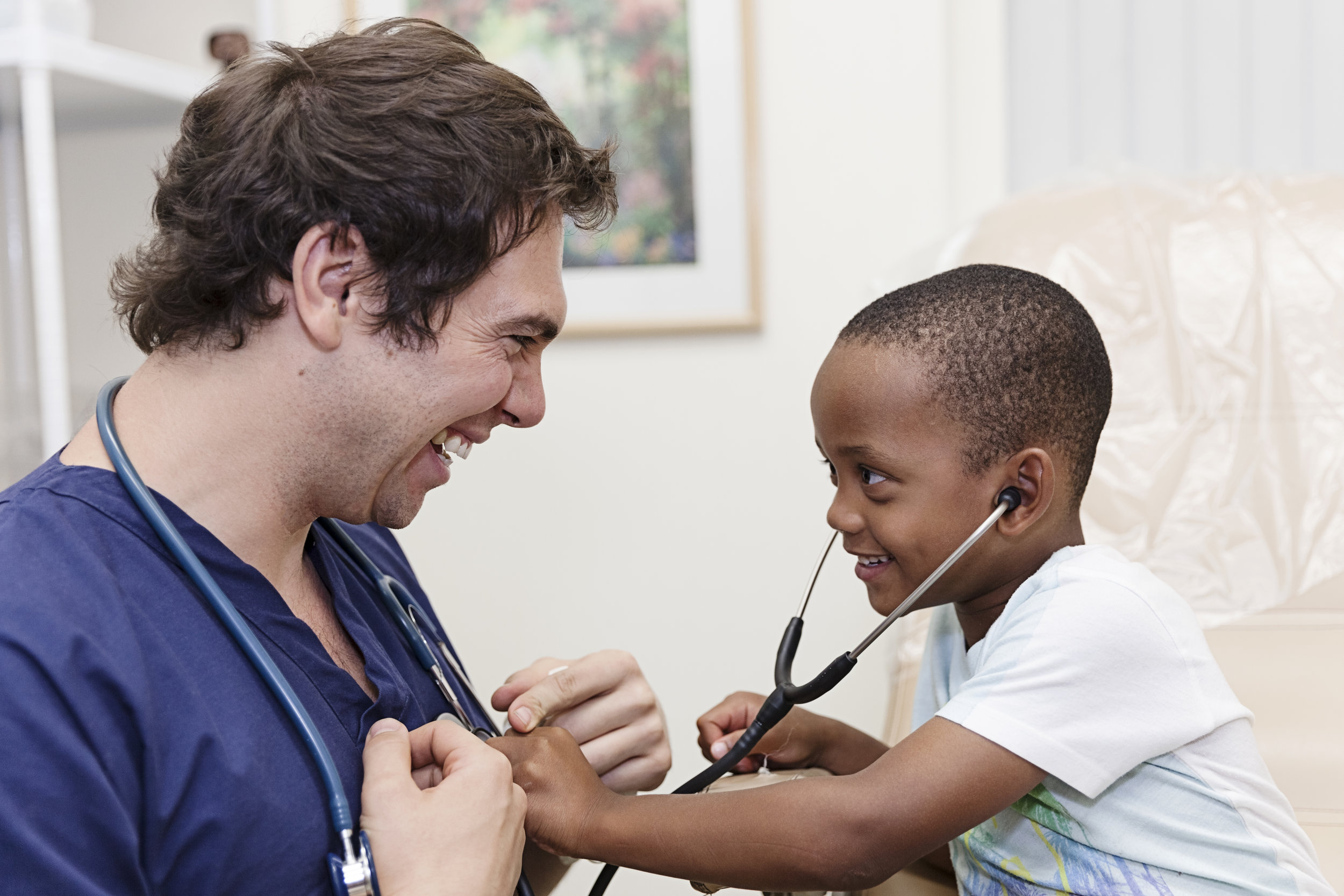 Kid playing with stethoscope