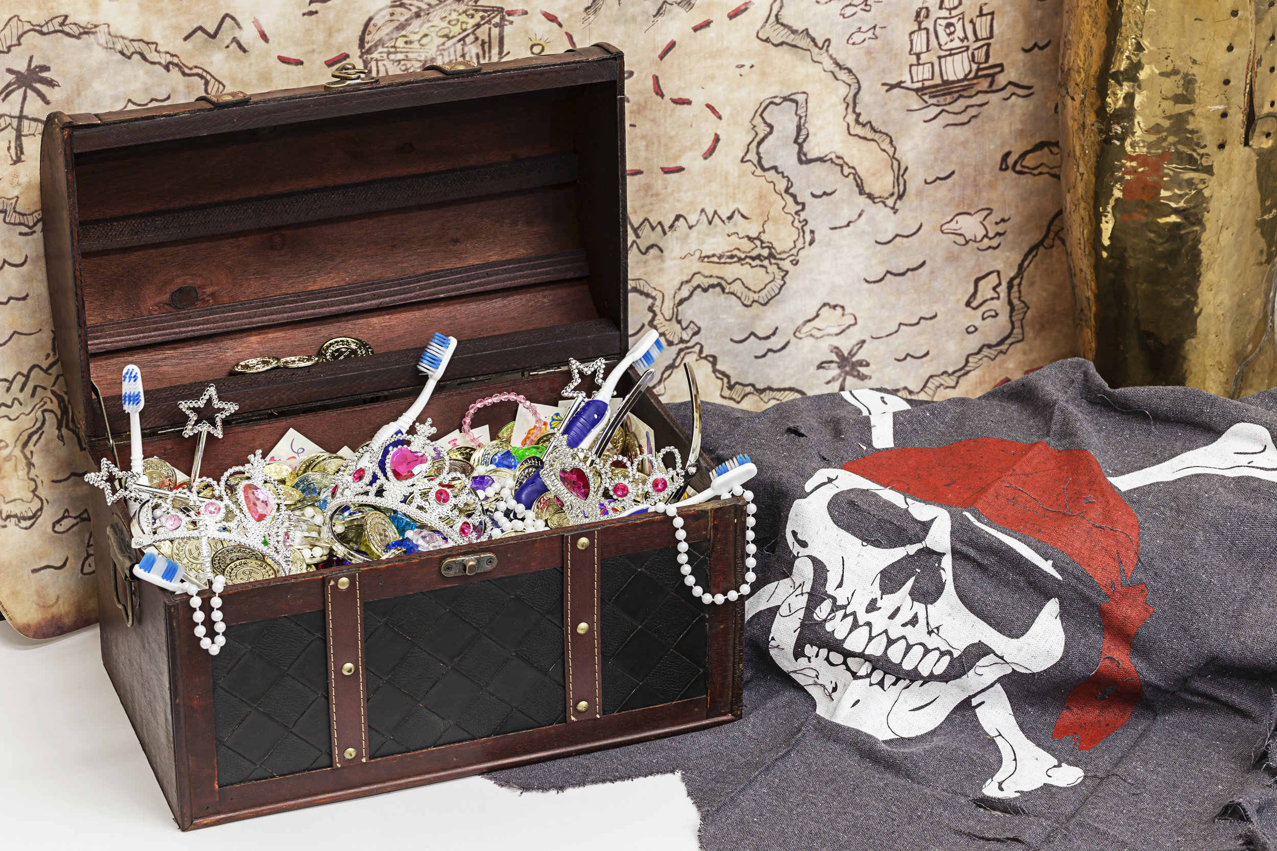 Toothbrushes and toy treasure chest for the kids