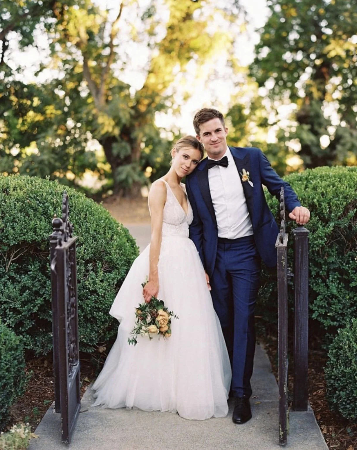 We’ve heard through the grapevine that this gorgeous couple will be featured on @stylemepretty very soon! 🙌🏼✨🏩🌳🌳 Photo: @lynetteboyle | Planning + Design: @kaellalynn | Florals: @amandavidmardesign |  Dress: @moniquelhuillier