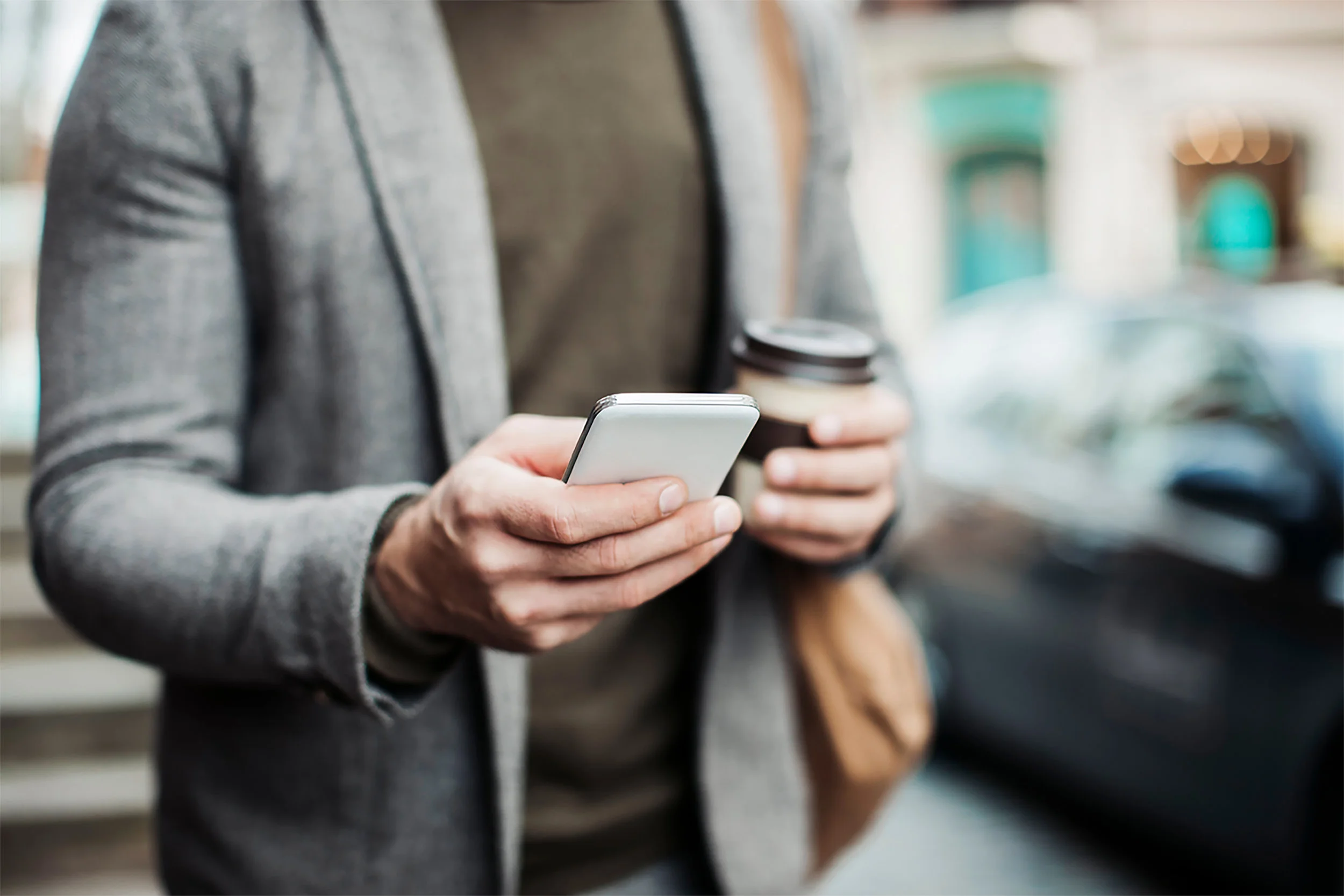 Businessman-using-smart-phone-small.jpg