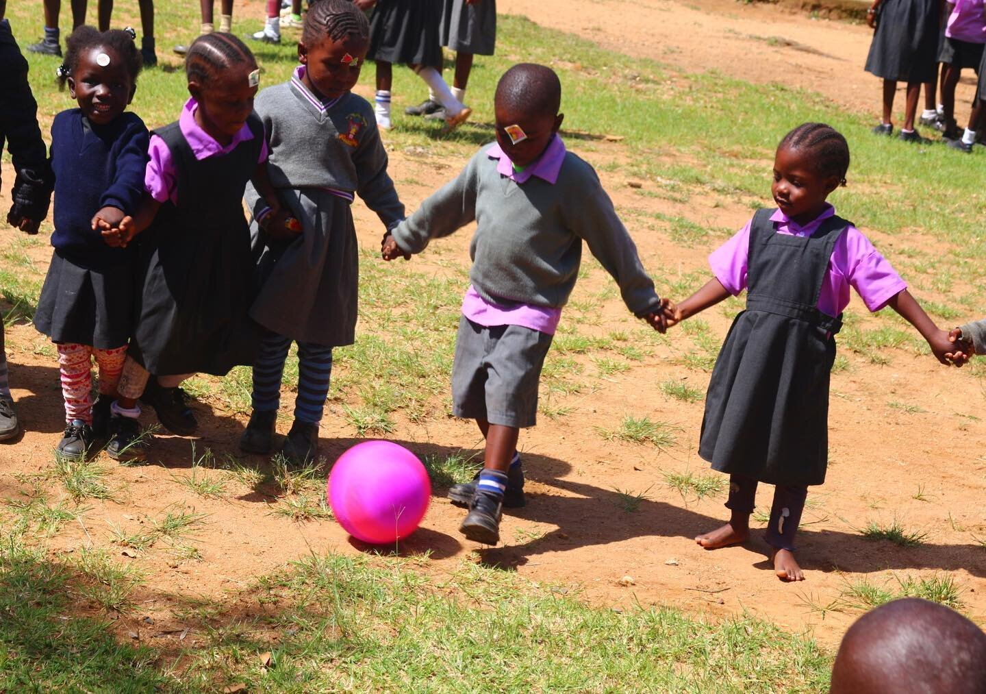 And the greatest of these… is love. How powerful is this photo of some of our sweet kiddos in their school uniforms?