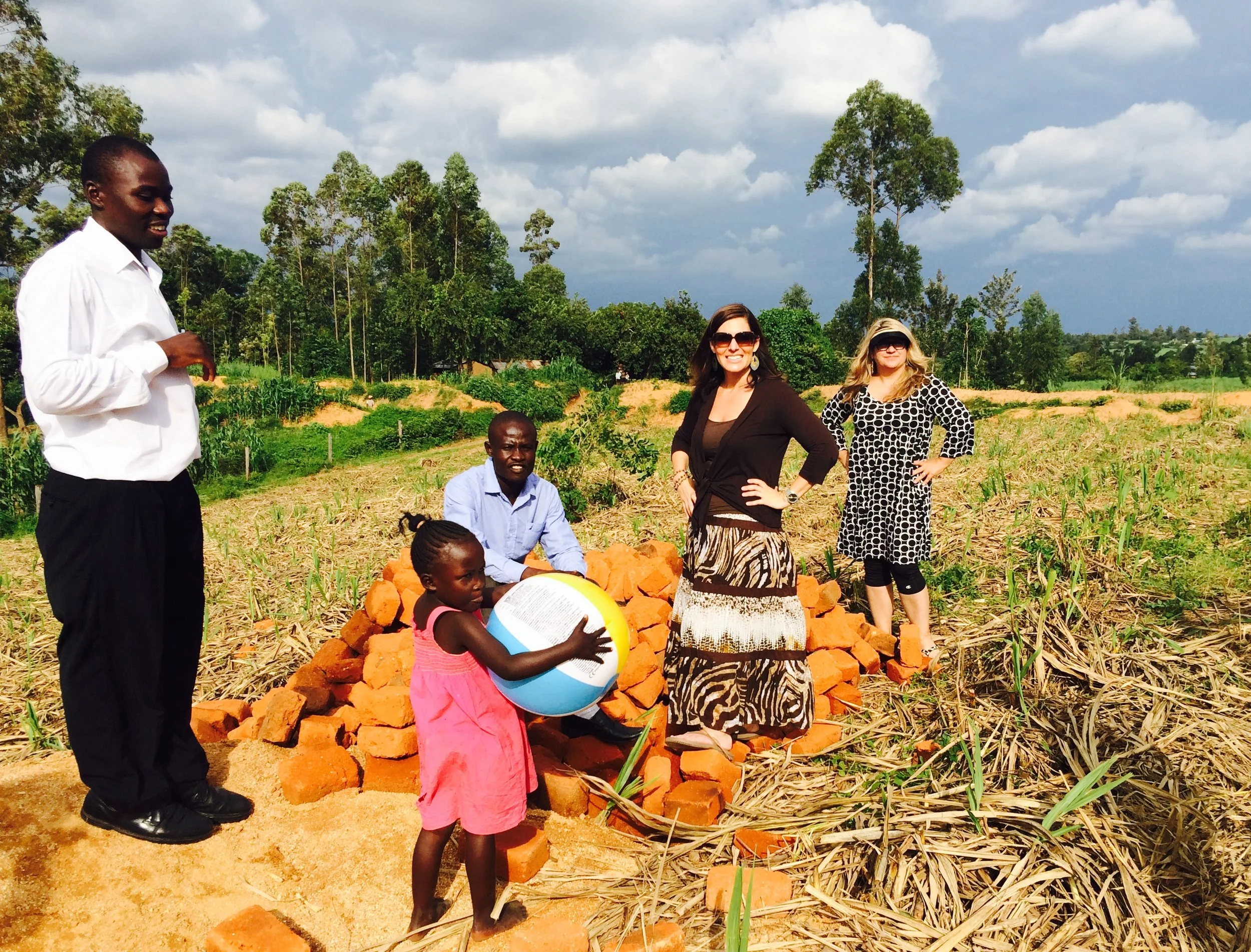 Stephanie and Christa in 2014 at the site of Give Amore's 2nd clean water well!