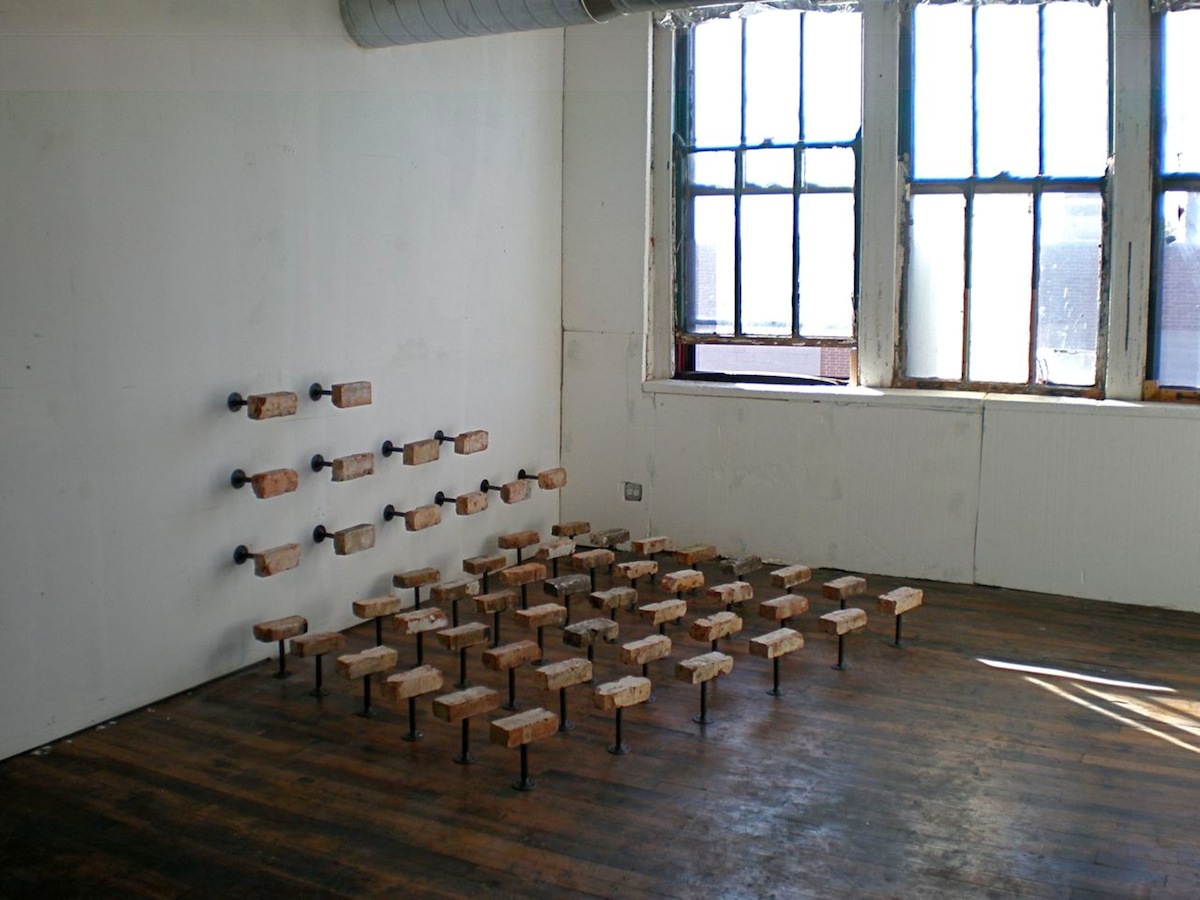 Robert Sebanc 54 Common Bricks 2014 96 x 96 x 12 bricks with iron pipe.jpg