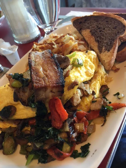 Veggie Omelette with added pork belly. 