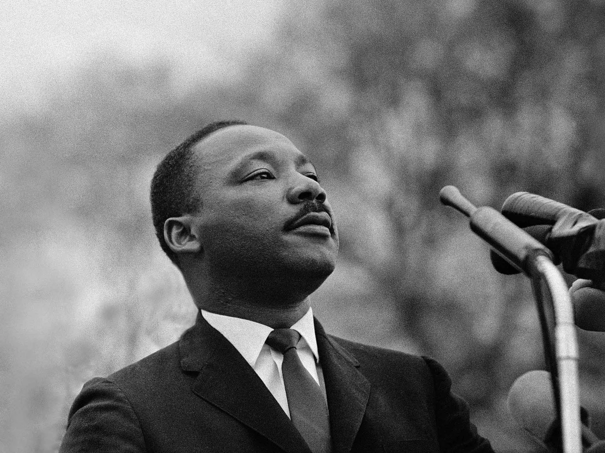 MONTGOMERY, AL - MARCH 25: Dr. Martin Luther King, Jr. speaking before crowd of 25,000 Selma To Montgomery, Alabama civil rights marchers, in front of Montgomery, Alabama state capital building. On March 25, 1965 in Montgomery, Alabama. (Photo by Stephen F. Somerstein/Getty Images)