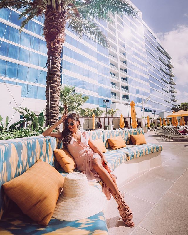 Take me back!!!!! @hardrocktampa pool area is so beautiful 😍🌴✨. I got to relax and lounge by the pool drinking my favorite cocktail #🍉Cooler YUM 😋!! #HardRockTampa #HardRockExpands #ad