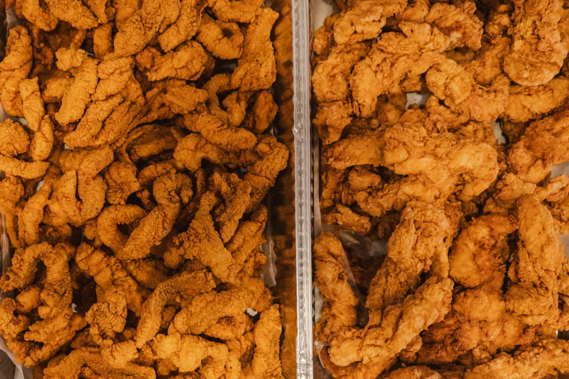 Transform your game day with our mouth-watering chicken and fish fry! Order now and get ready to score big with our unbeatable catering. Visit our website for a quote and let's get this game on!