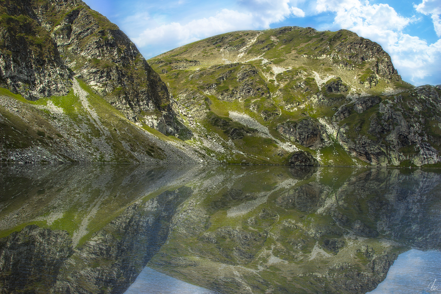 Sitting next to a Rila-Lake.