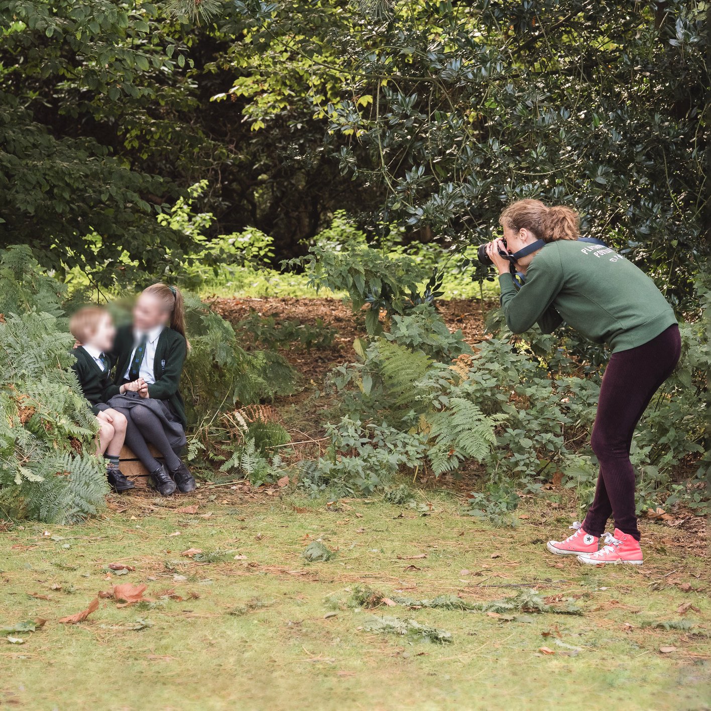 school photographer Aurelie Kennedy taking photo outdoors