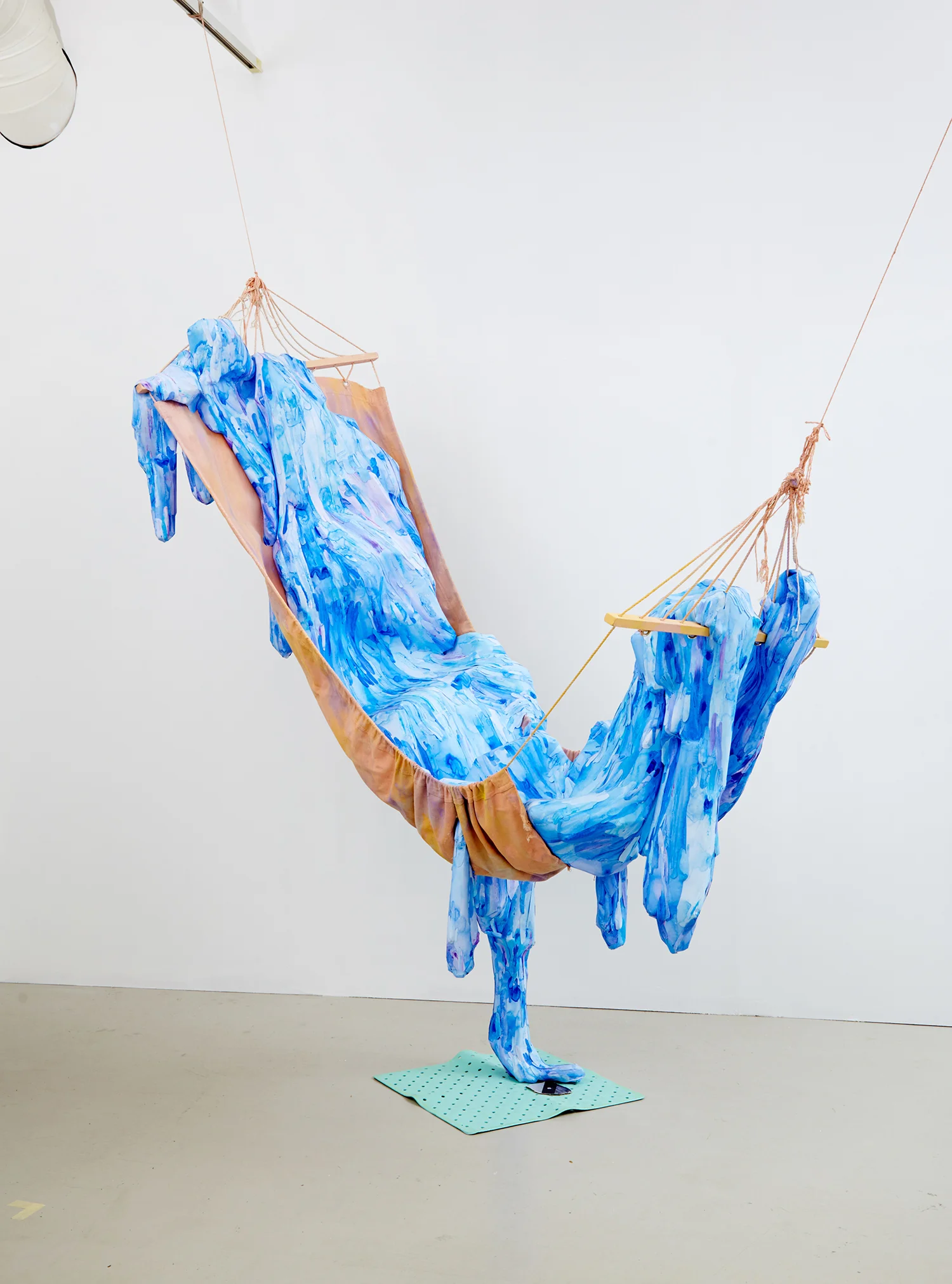 Afternoon Splash (from the series 'User Experience'), 2015, paper, hammock, acrylic paint, glue, bathroom carpet, cardboard. | Photo: Krisztián Zana.