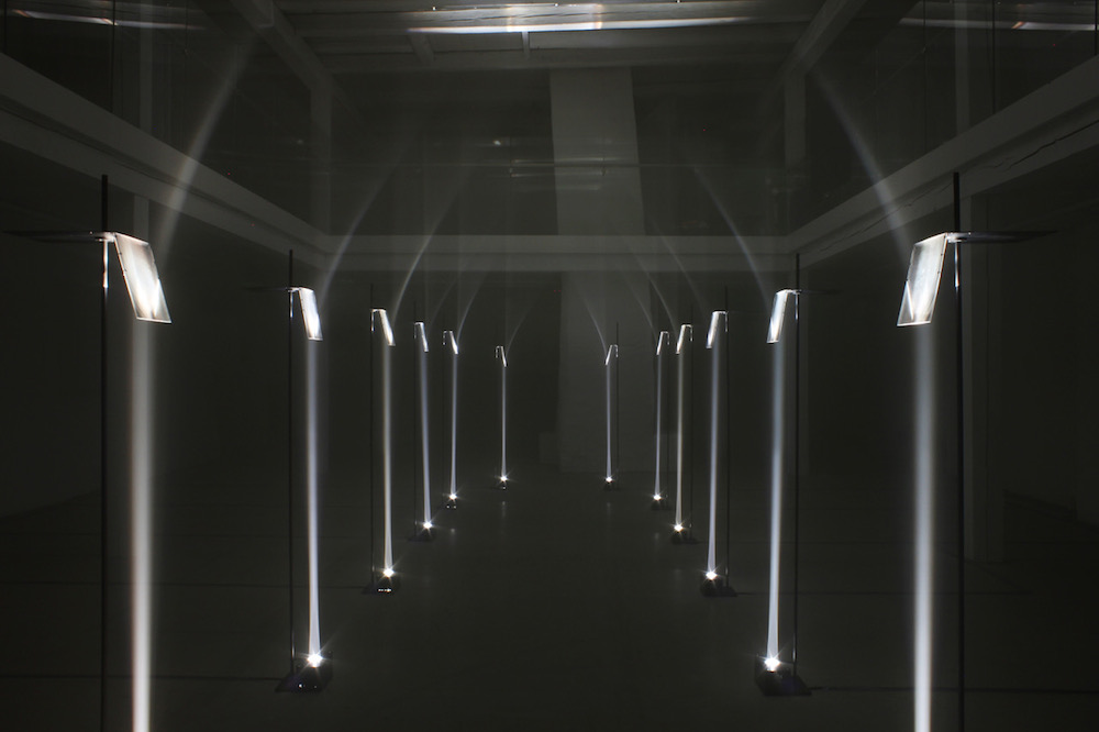 Troika “Arcades”, 2012 (Lenses, lights, steel, aluminium). Installation view at Buda Tower, Kortrijk, Belgium. Courtesy the artists.