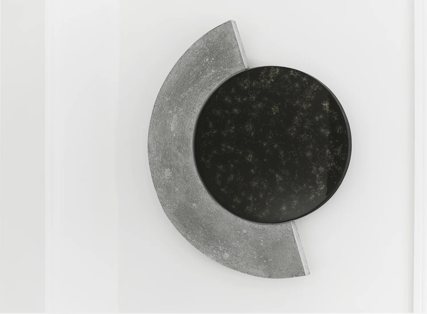 Studio ThinkingHand “Eclipse #2,” 2018 (Epoxy resin, concrete, pigment, dandylions. Foraged September 2018 from Værløse, DK. 88(w) x 108(h) x 5(d) cm).