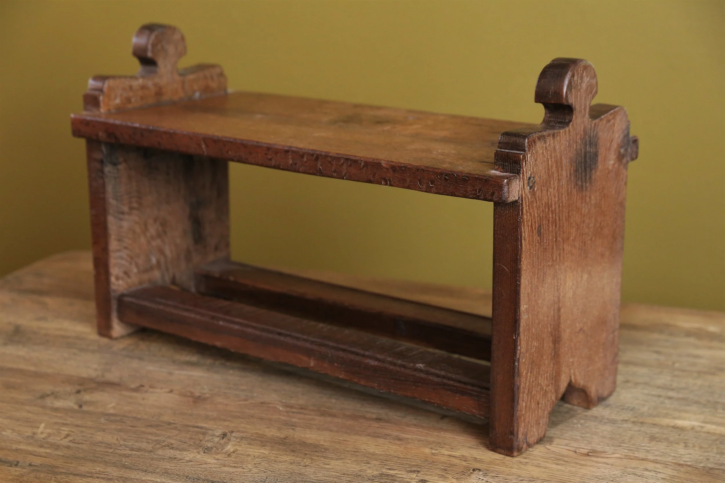 Hand-carved wooden foot stool