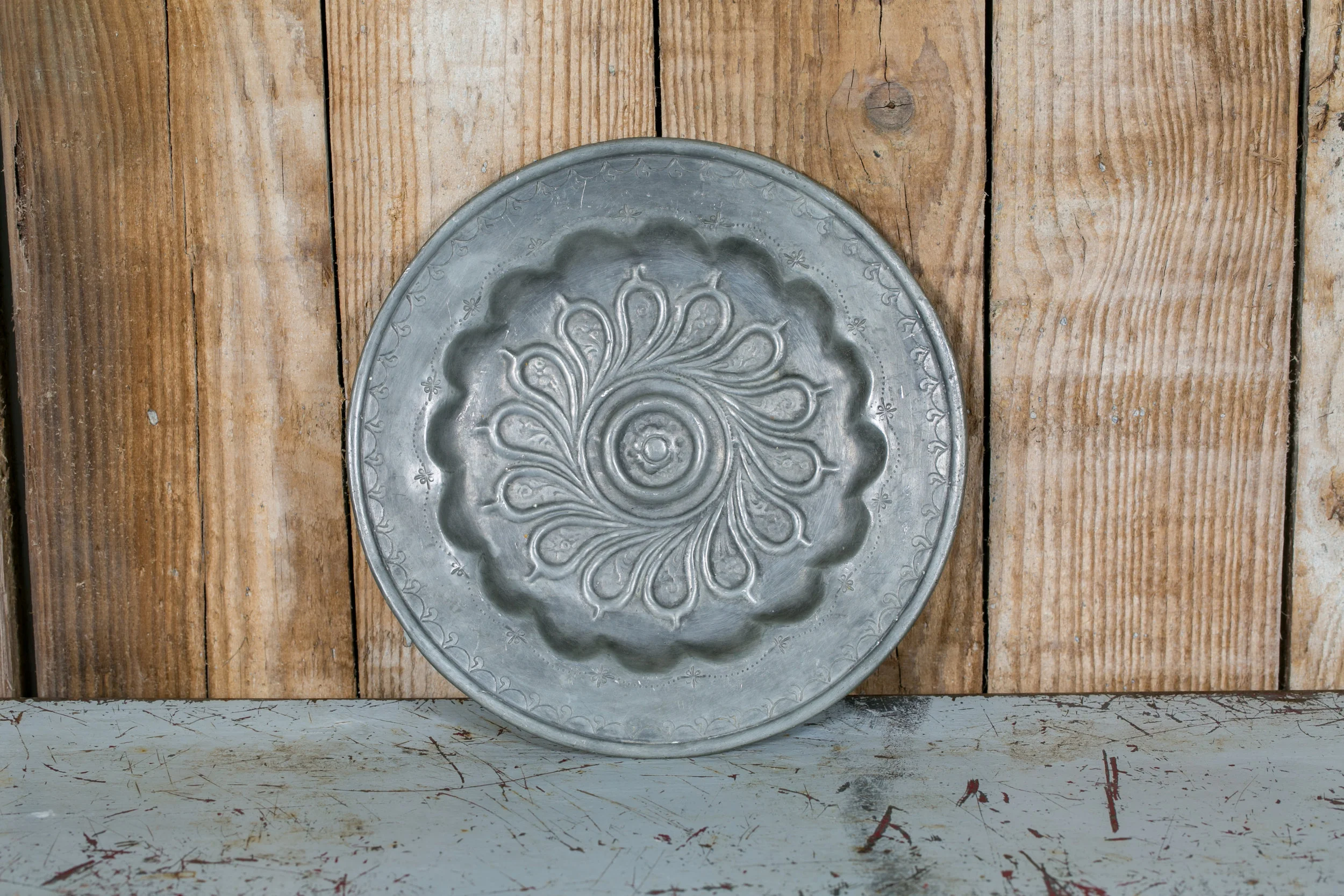 Measures 9.75" D x .5" H.