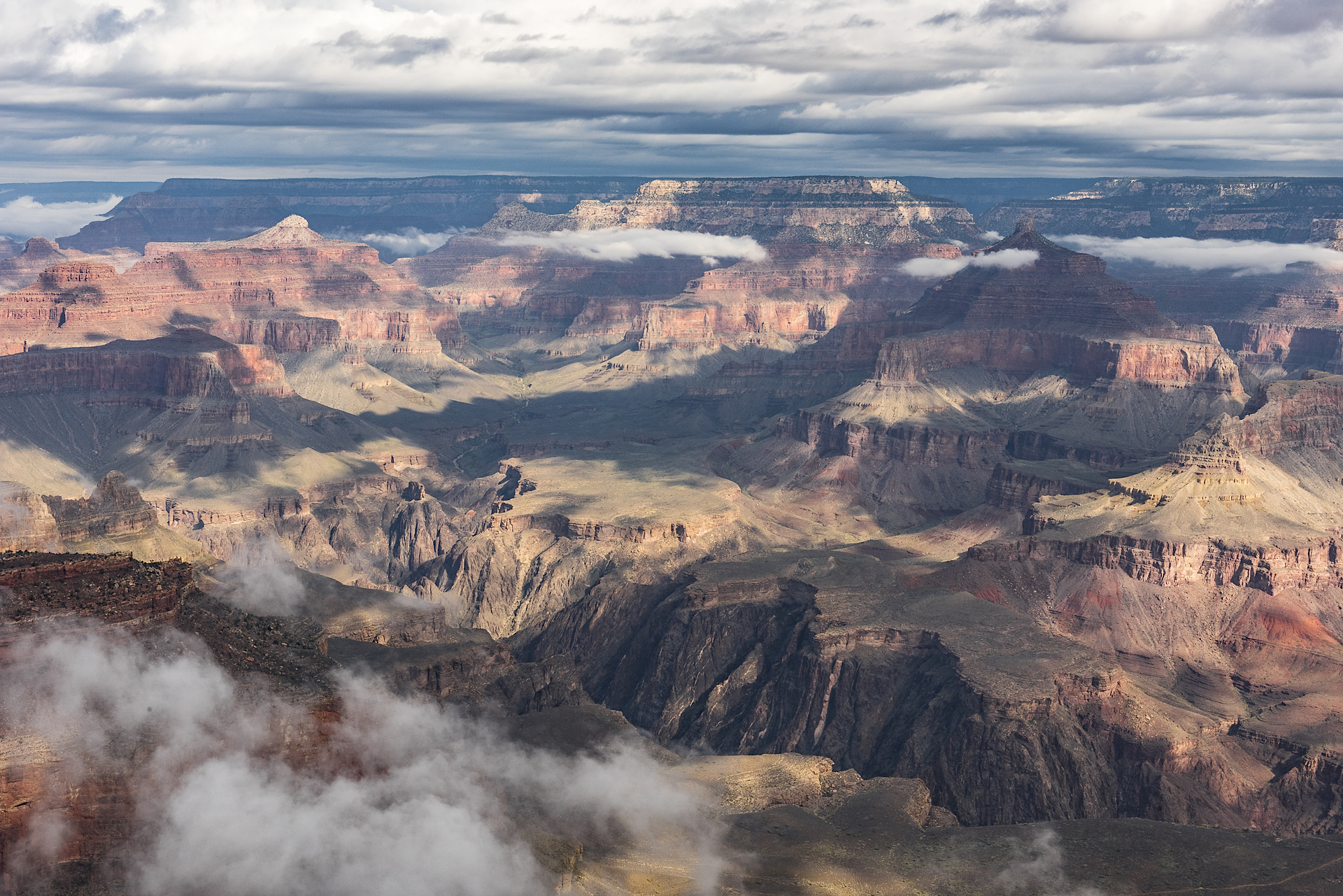 Morning clouds linger over the Grand Canyon at Yavapai Point