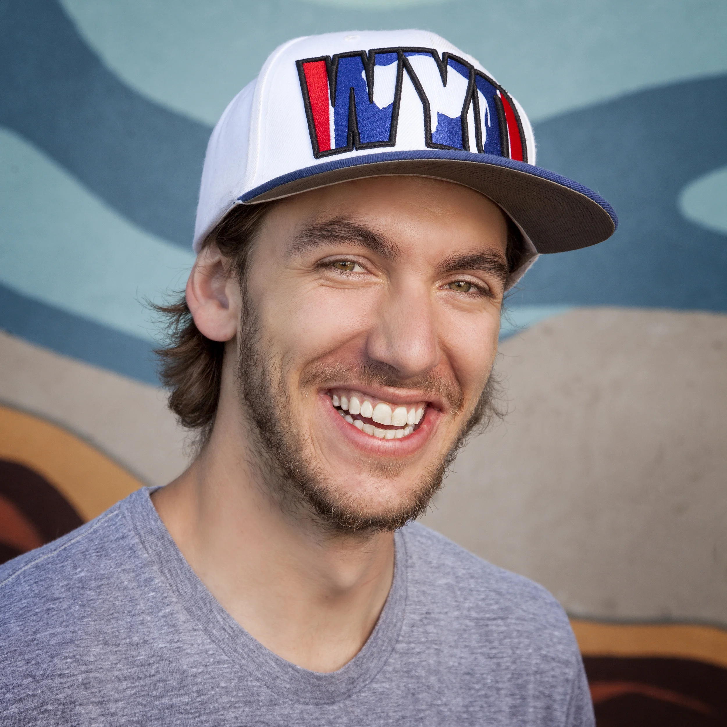 Evan Levi joined the Laramie Mural Project in 2014 and is a lifelong Laramie resident, raised on community and hard work. Evan has worked in downtown Laramie for his father, Lester Levi at Van’s Wholesale for most of his life. Evan is a craftsman and paints for the pure joy of it. He has shown his work in Denver and Steamboat Springs, Colorado. Evan worked collaboratively on the fish mural. 