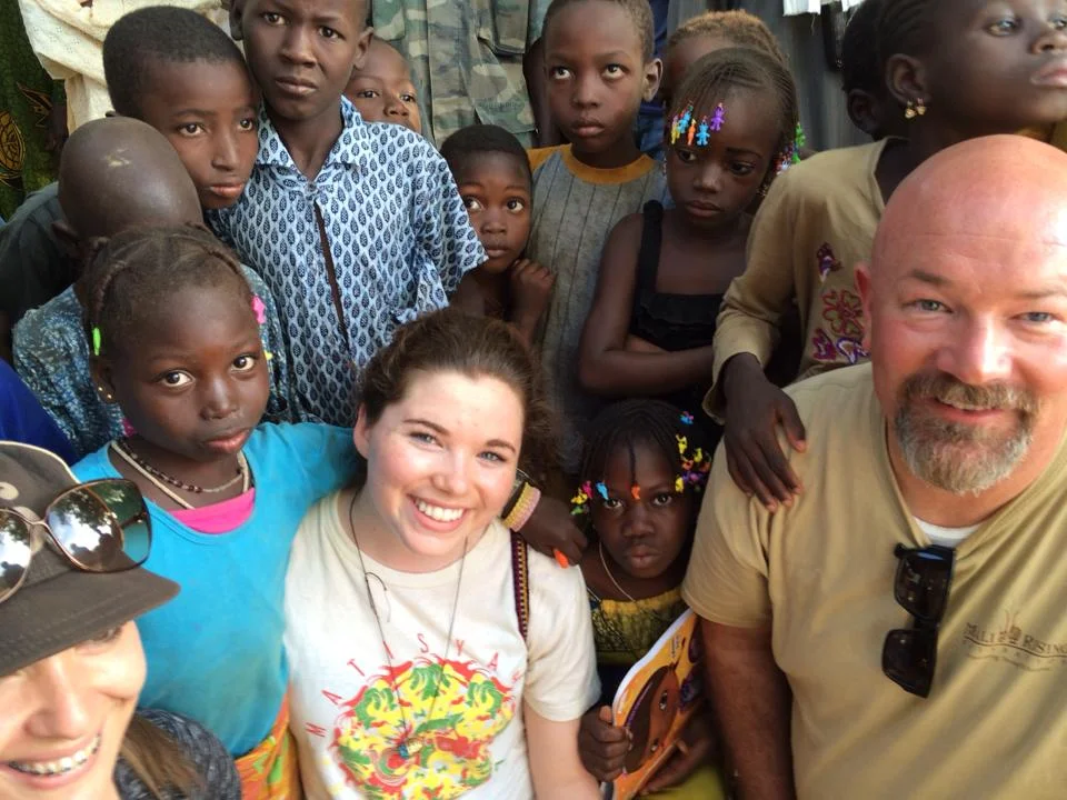 Brianne in Mali visiting with Mali Rising students and family.