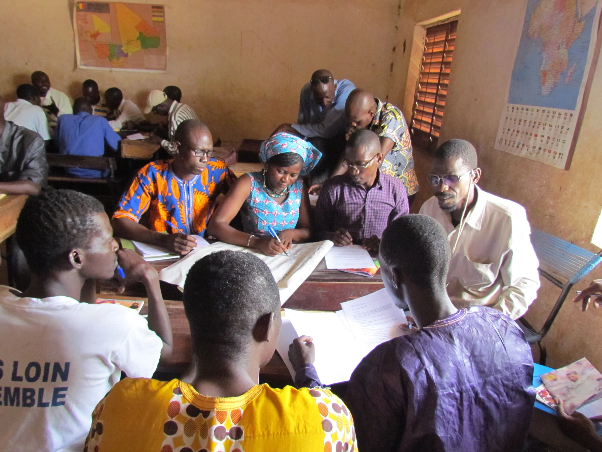 Teachers work on a joint project at our March 2017 teacher training. Thirty-six teachers came together for 5-days of learning how to better help our kids. Local professional teacher trainers lead the sessions.