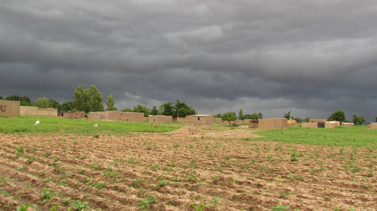 A view of Sebela village under threatening clouds.
