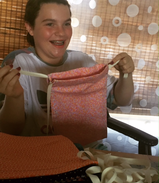  Skyler shows of a kit bag -- the simplest piece to sew in the kits. 