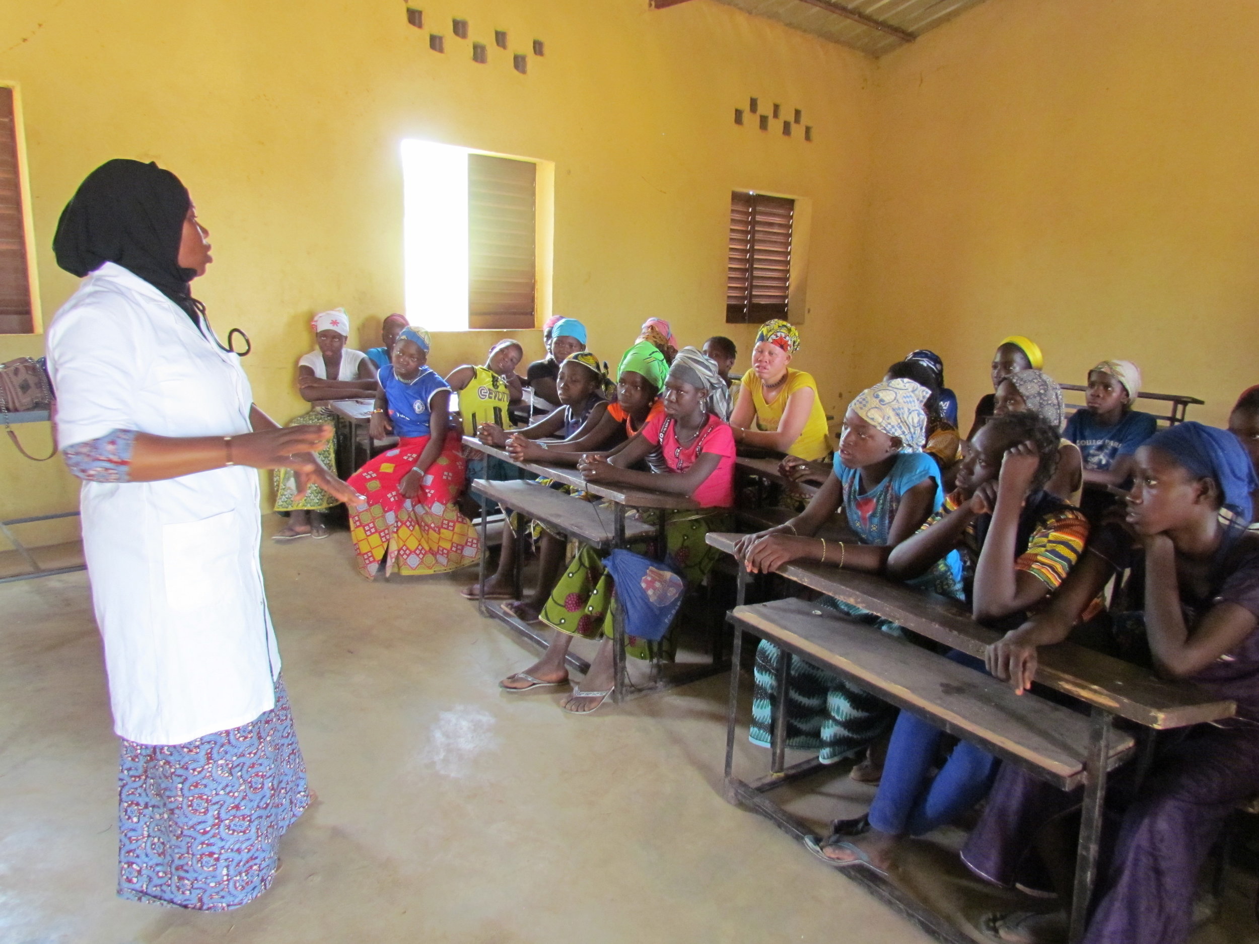  The girls of Kolimba listen intently as they consider what a career in medicine might mean for them. 