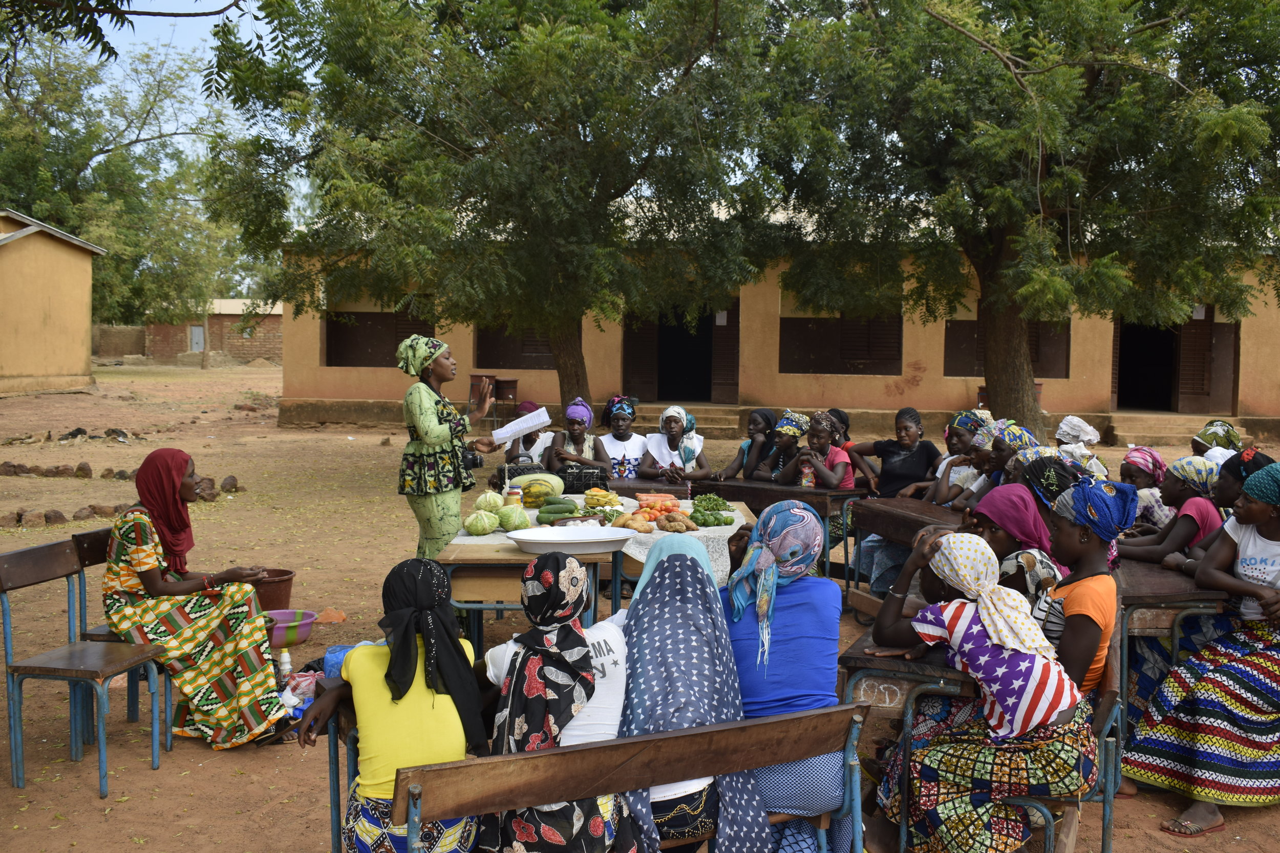 Girls Project Coordinator Hindaty talks with the girls.