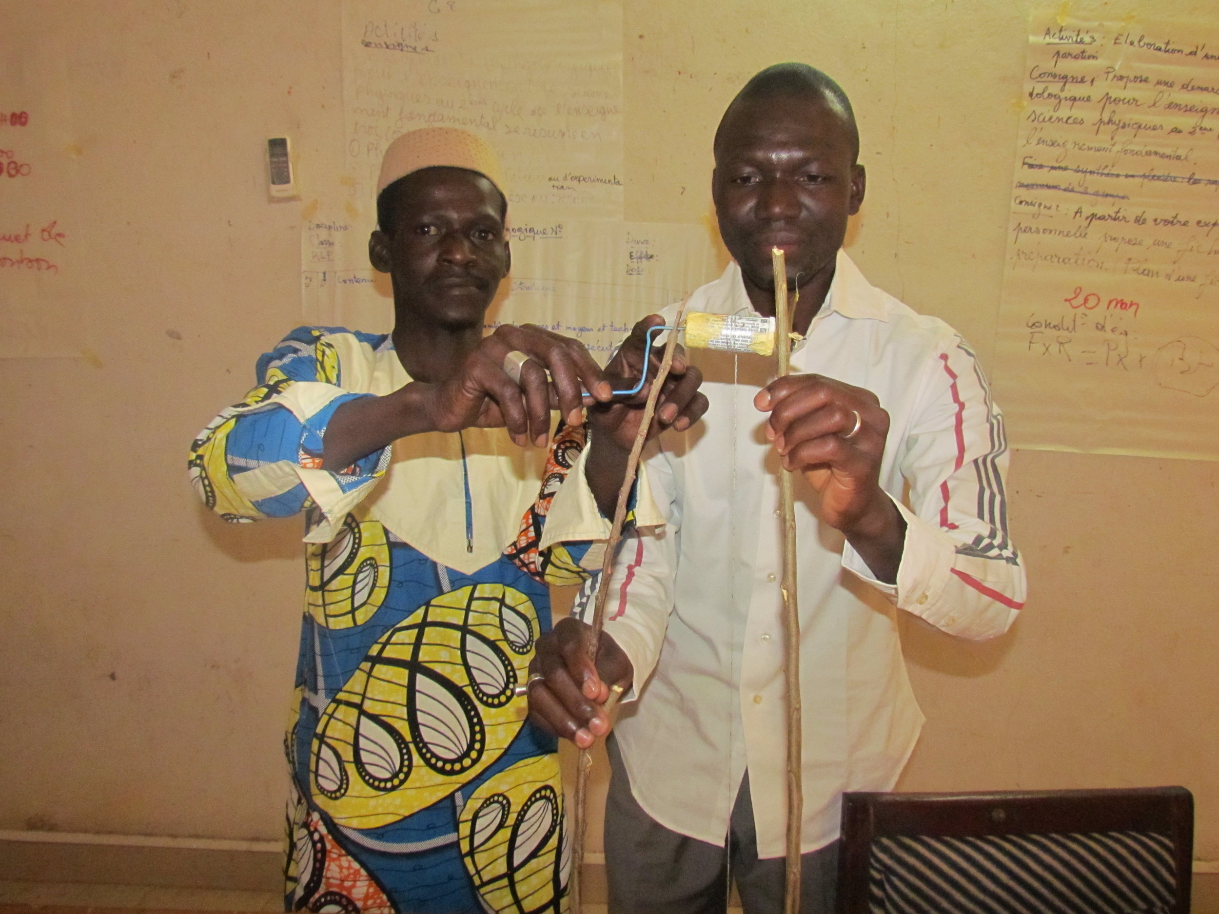  Science teachers learn how to build a pulley from available materials to demonstrate real-world science concepts to their students. 