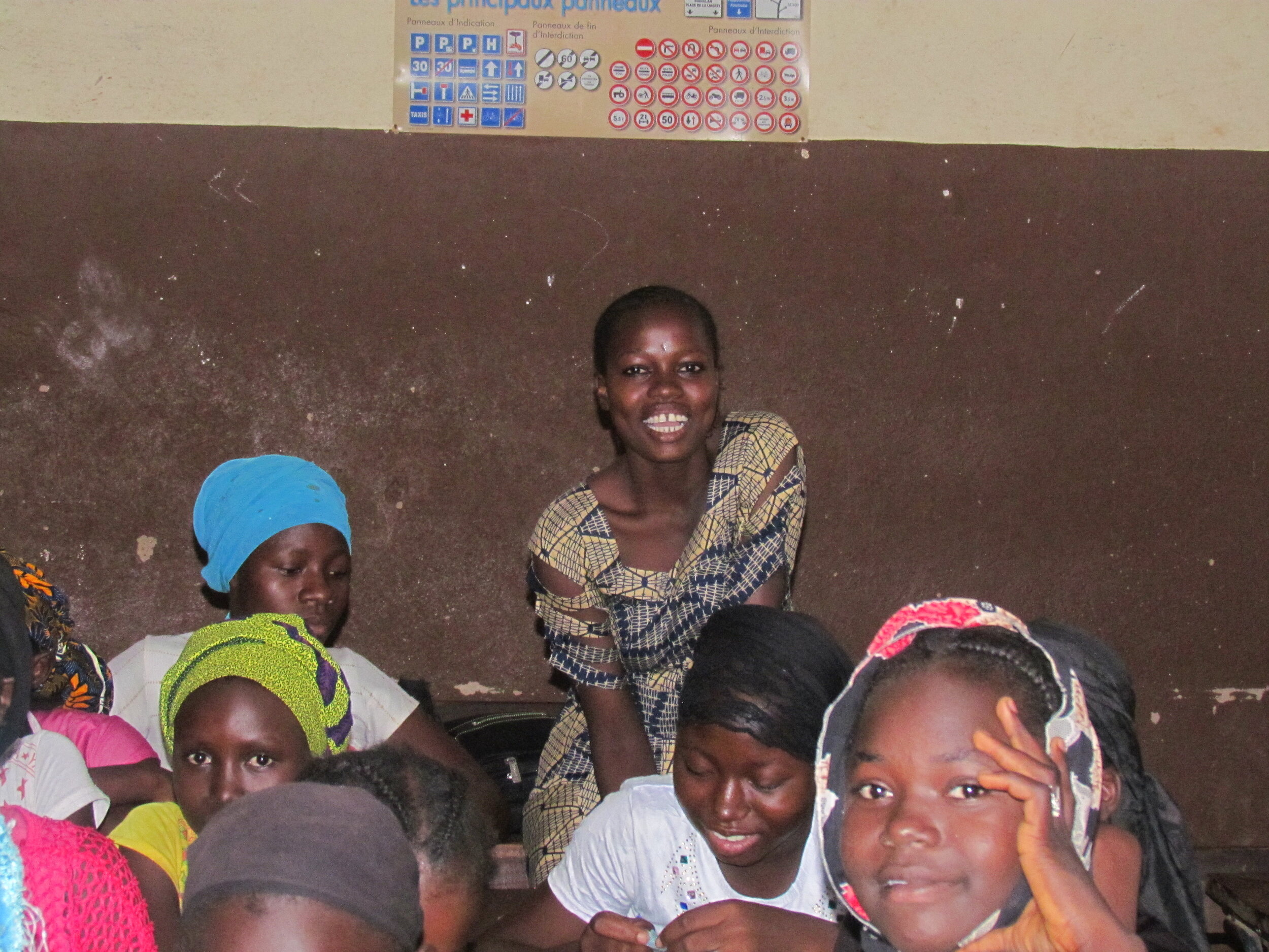 Tenimba in the classroom with her very own Girls Group.