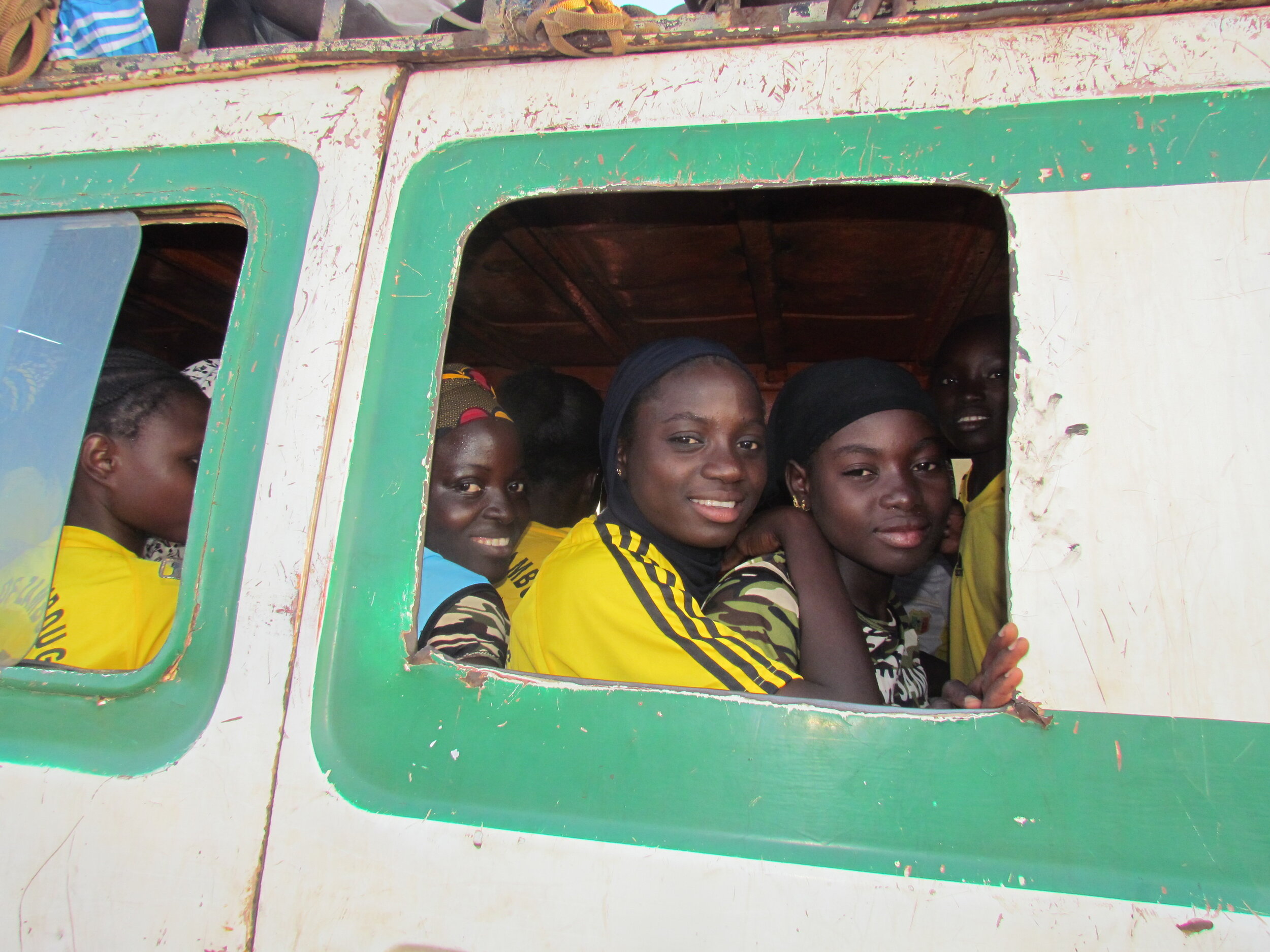 Zambougou girls head down the road to the match at Tamala.