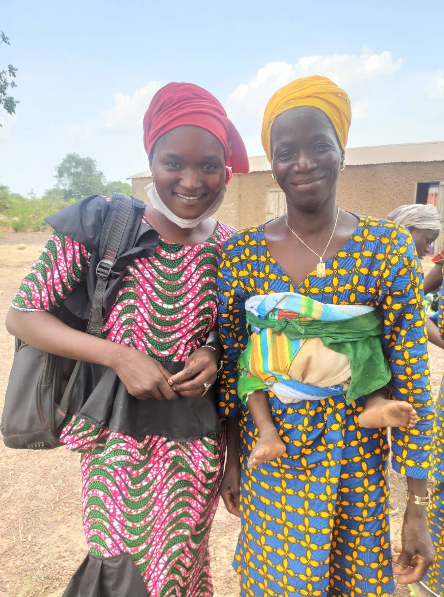 Mariam and her eldest daughter, Kadiatou -- soon to be a fully fledged nurse's assistant/midwife, pose for the camera.