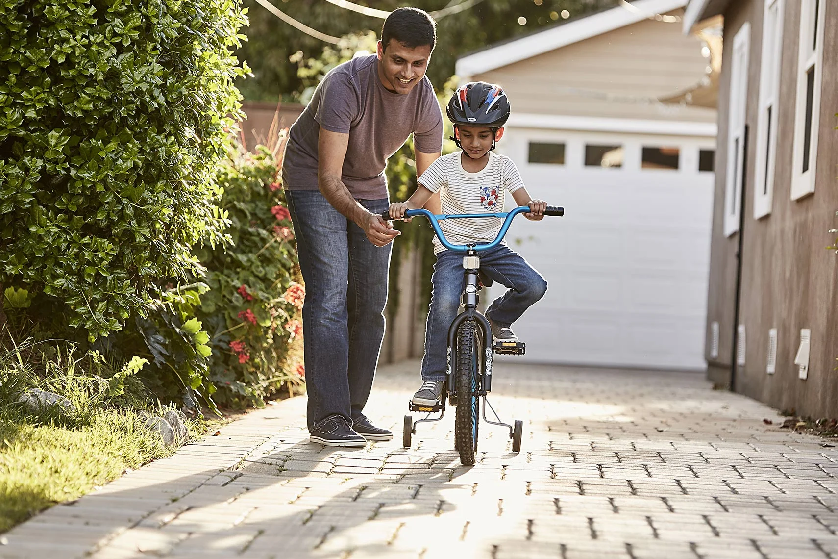 Jeremy-Frechette-Father-son-riding-bike.jpg