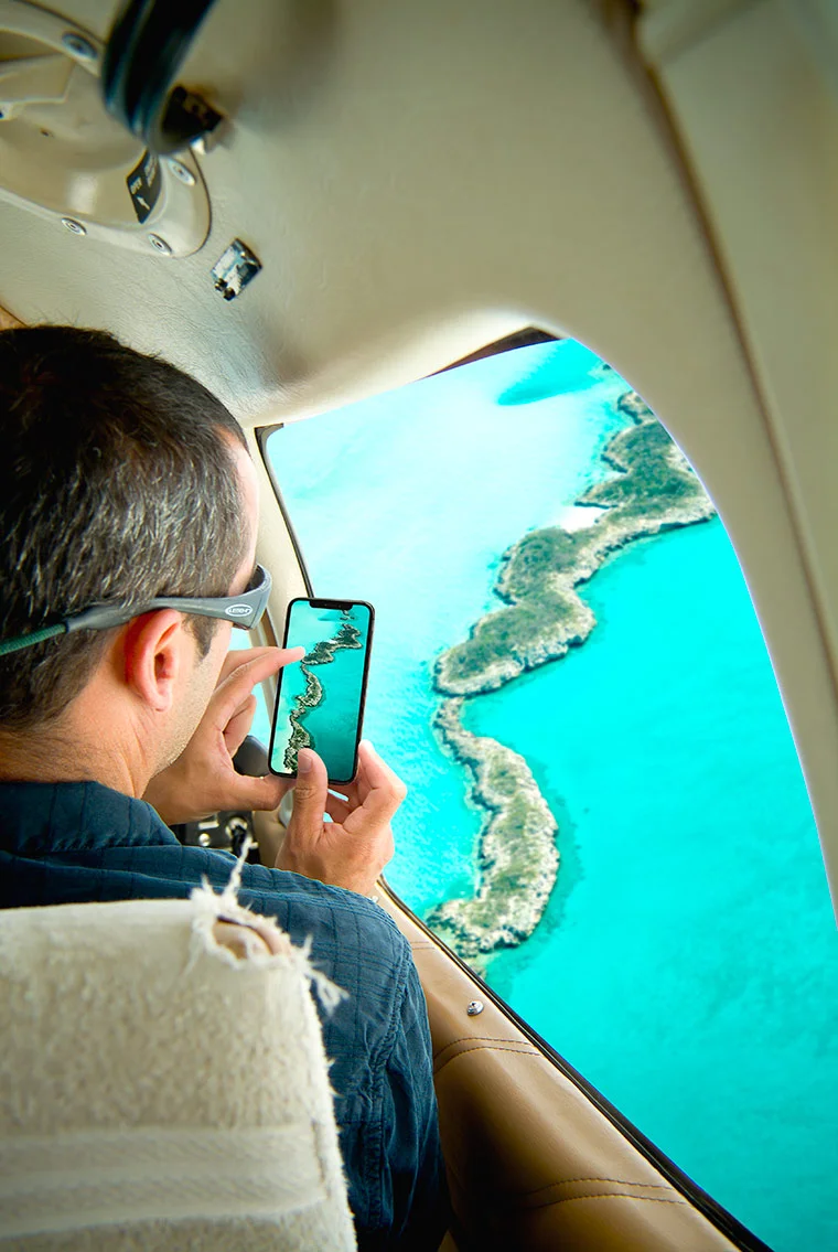 Jeremy-Frechette-Iphone-out-plane-window-bahamas-02.jpg