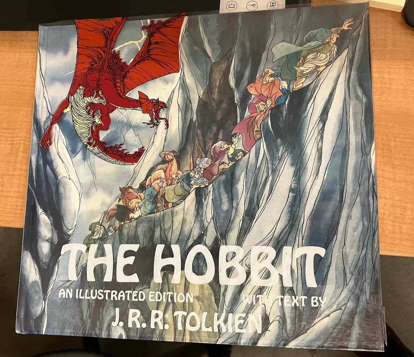 COLLECTORS CORNER FEATURE OF THE WEEK: From page-to-screen-to-page again! Published shortly after the release of the 1977 animated film, this rare and remarkable copy of the Hobbit contains the full text of Tolkien&rsquo;s original story along with f